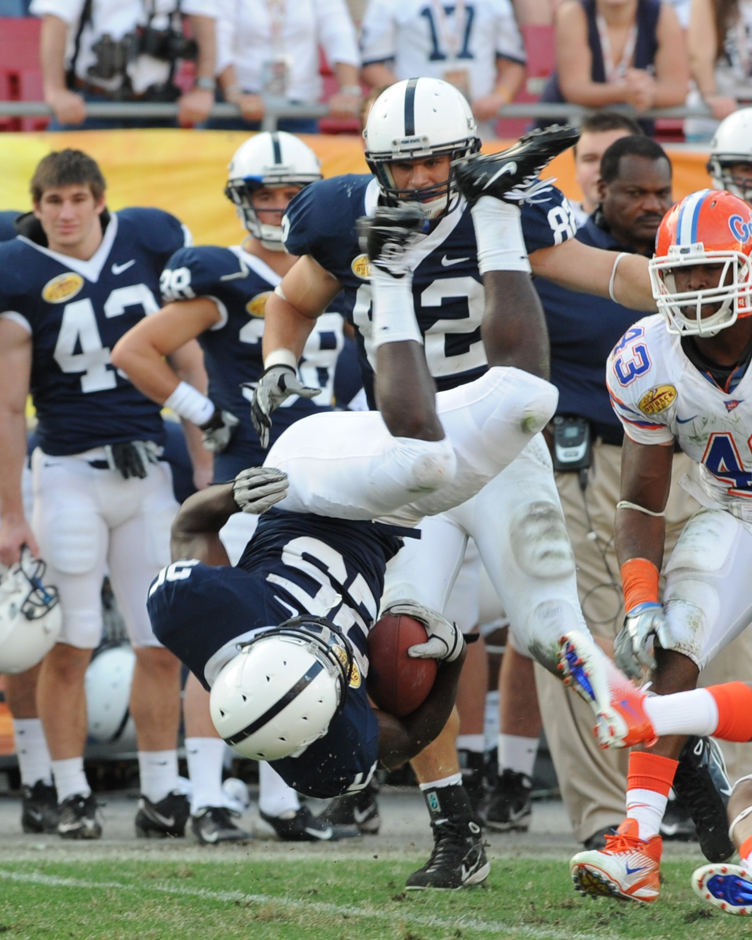 TAMPA, FL - JANUARY 1:  Tailback Silas Redd #25 of the Penn State Nittany Lions tumbles against the Florida Gators January 1, 2010 in the 25th Outback Bowl at Raymond James Stadium in Tampa, Florida.  (Photo by Al Messerschmidt/Getty Images)