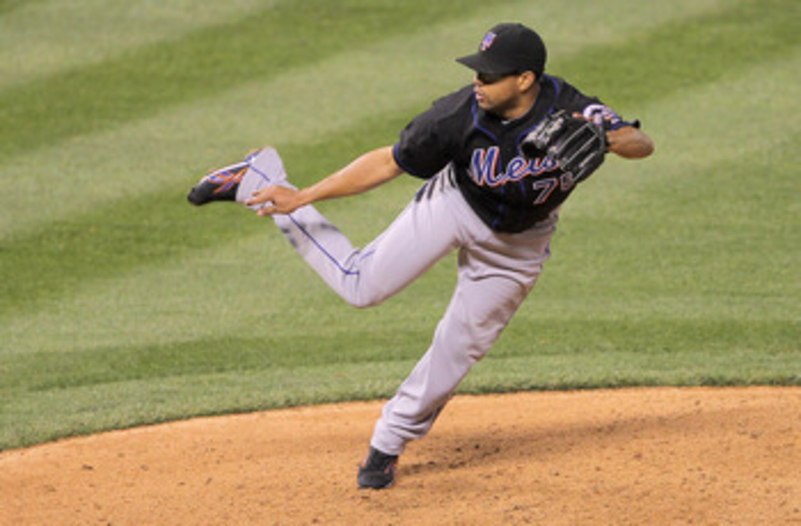DENVER, CO - MAY 10:  Francisco Rodriguez #75 of the New York Mets pitches in the ninth inning against the Colorado Rockies at Coors Field on May 10, 2011 in Denver, Colorado. Rodriguez earned a save as the Mets defeated the Rockies 4-3.  (Photo by Doug P