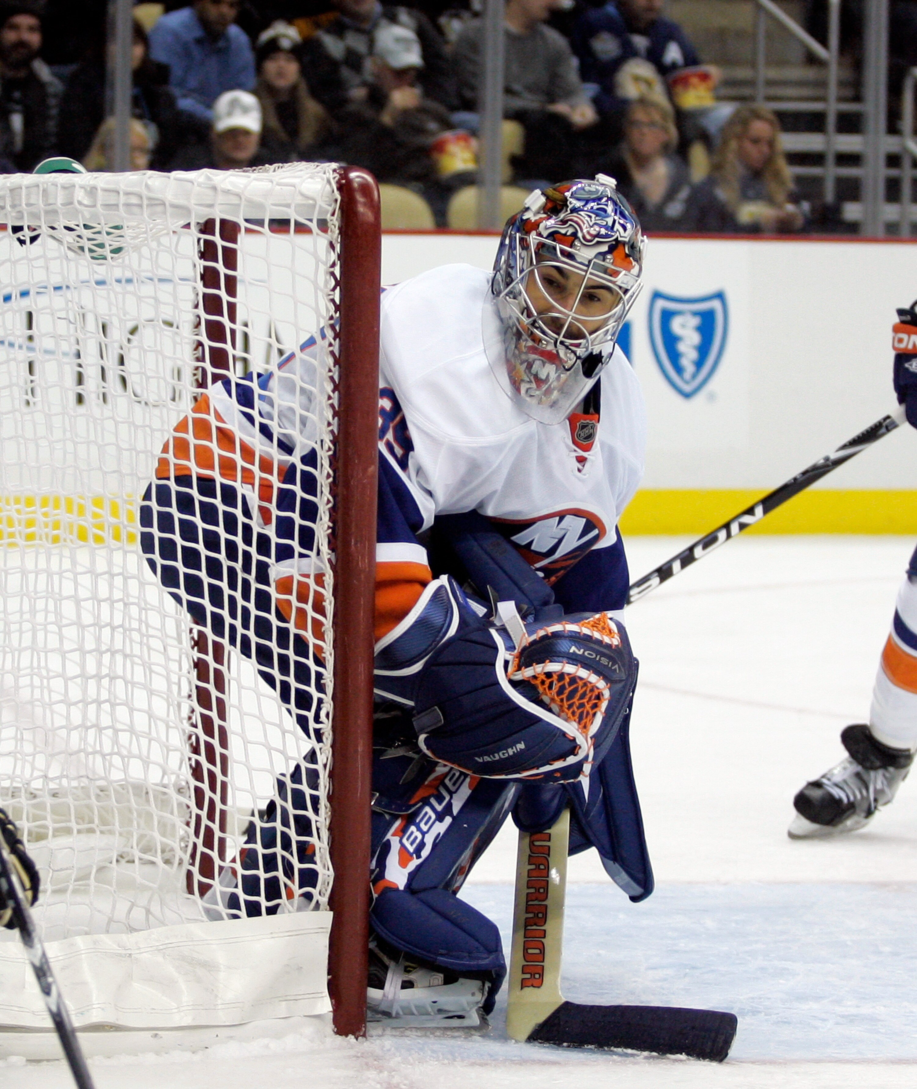 PITTSBURGH, PA - FEBRUARY 02:  Rick DiPietro #39 of the New York Islanders eyes the puck in the corner against the Pittsburgh Penguins at Consol Energy Center on February 2, 2011 in Pittsburgh, Pennsylvania.  (Photo by Justin K. Aller/Getty Images)