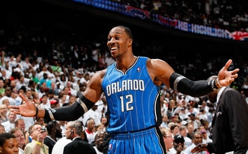 ATLANTA, GA - APRIL 22:  Dwight Howard #12 of the Orlando Magic reacts after being called for a technical foul against the Atlanta Hawks during Game Three of the Eastern Conference Quarterfinals in the 2011 NBA Playoffs at Philips Arena on April 22, 2011 