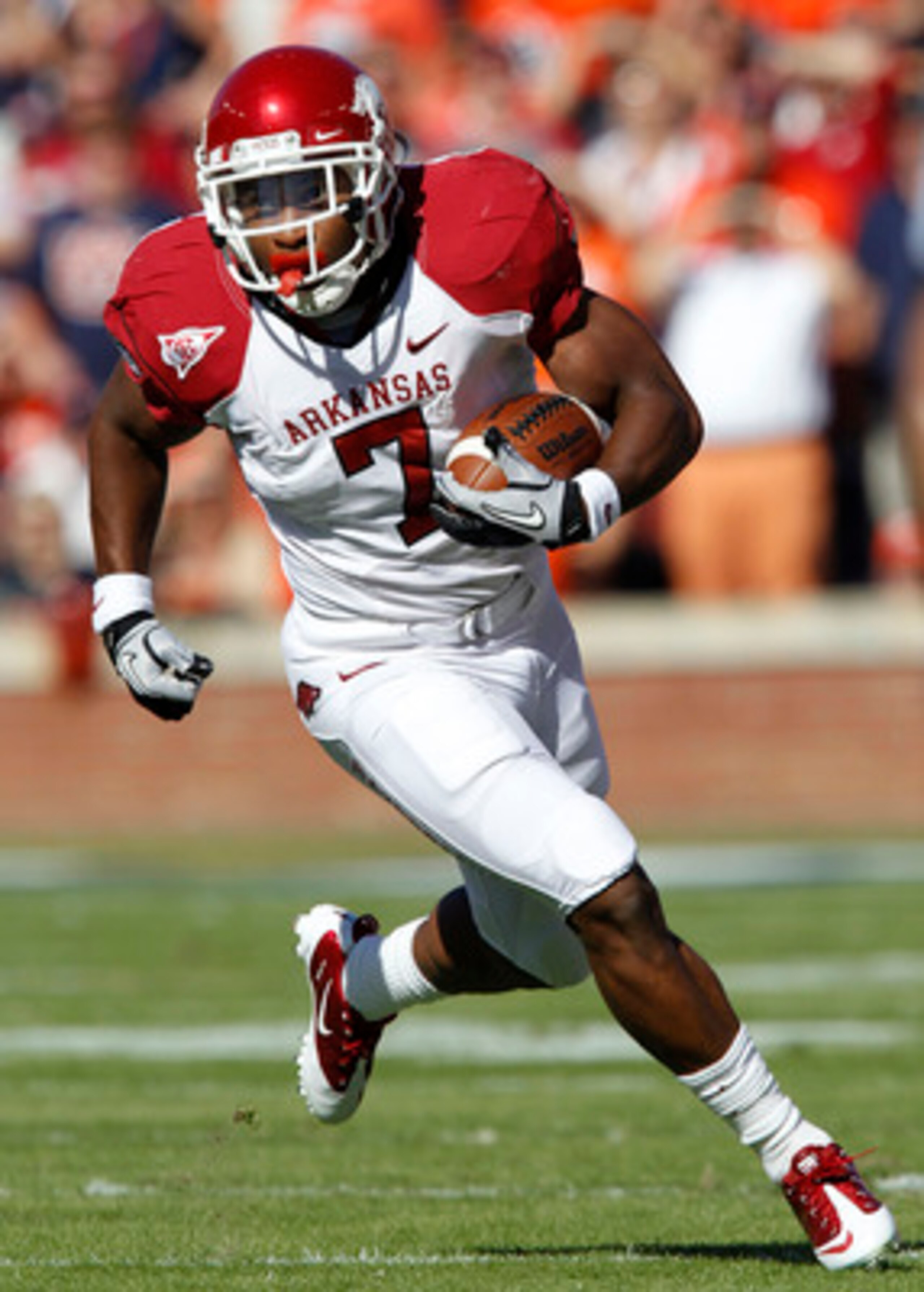 AUBURN, AL - OCTOBER 16:  Running back Knile Davis #7 of the Arkansas Razorbacks runs with the ball during the game against the Auburn Tigers at Jordan-Hare Stadium on October 16, 2010 in Auburn, Alabama.  The Tigers beat the Razorbacks 65-43.  (Photo by