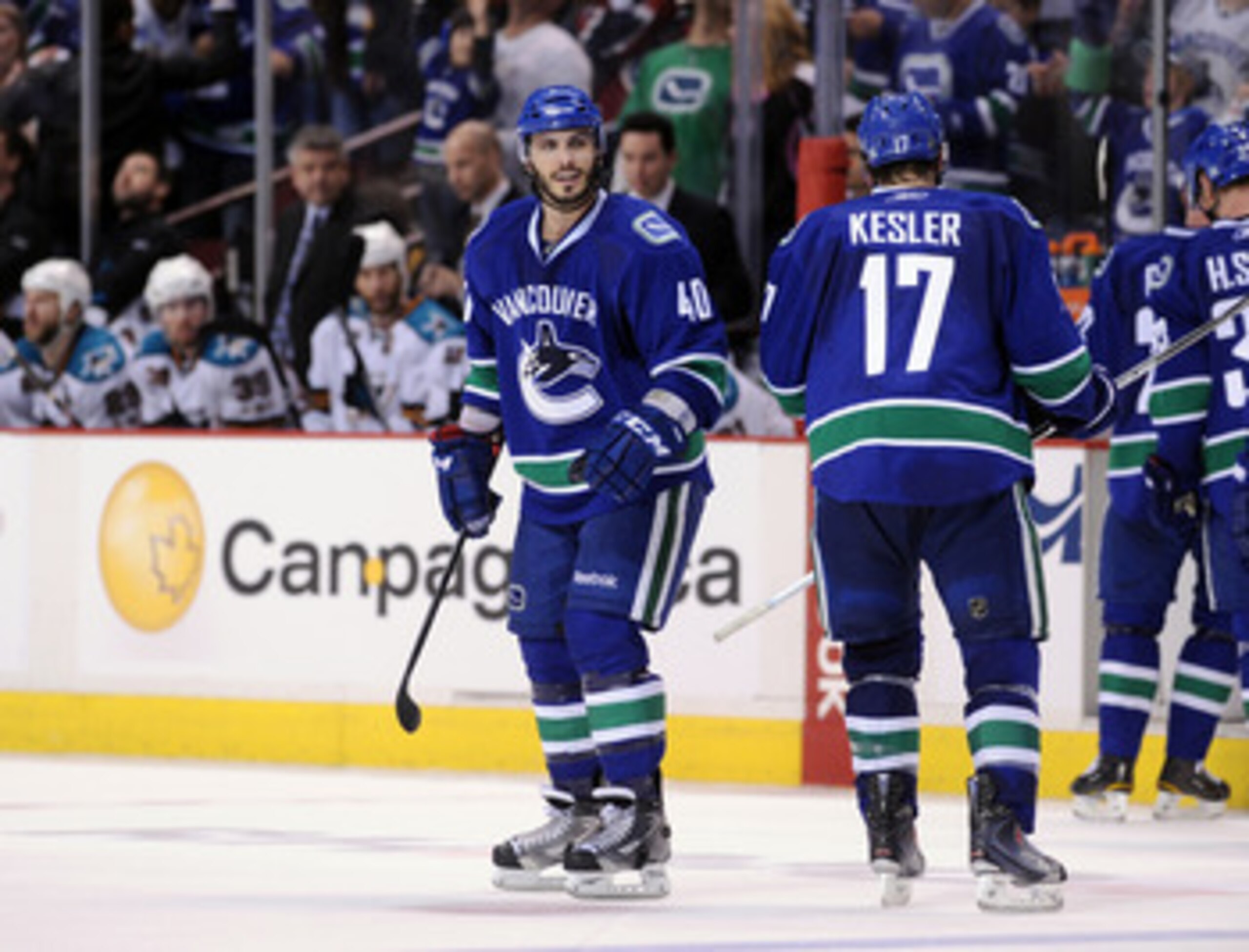 VANCOUVER, CANADA - MAY 15: Maxim LaPierre #40 of the Vancouver Canucks looks on during a break in play against the San Jose Sharks in Game One of the Western Conference Finals during the 2011 Stanley Cup Playoffs at Rogers Arena on May 15, 2011 in Vanco VANCOUVER, CANADA - MAY 15: Maxim LaPierre #40 of the Vancouver Canucks looks on during a break in play against the San Jose Sharks in Game One of the Western Conference Finals during the 2011 Stanley Cup Playoffs at Rogers Arena on May 15, 2011 in Vanco