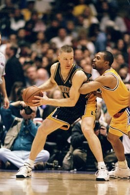 14 Feb 1999: Chris Mullin #17 of the Indiana Pacers controls the ball as Derek Fisher #2 of the Los Angeles Lakers tries to block at the Great Western Forum in Inglewood, California. The Pacers defeated the Lakers 101- 99.  Mandatory Credit: Donald Mirall