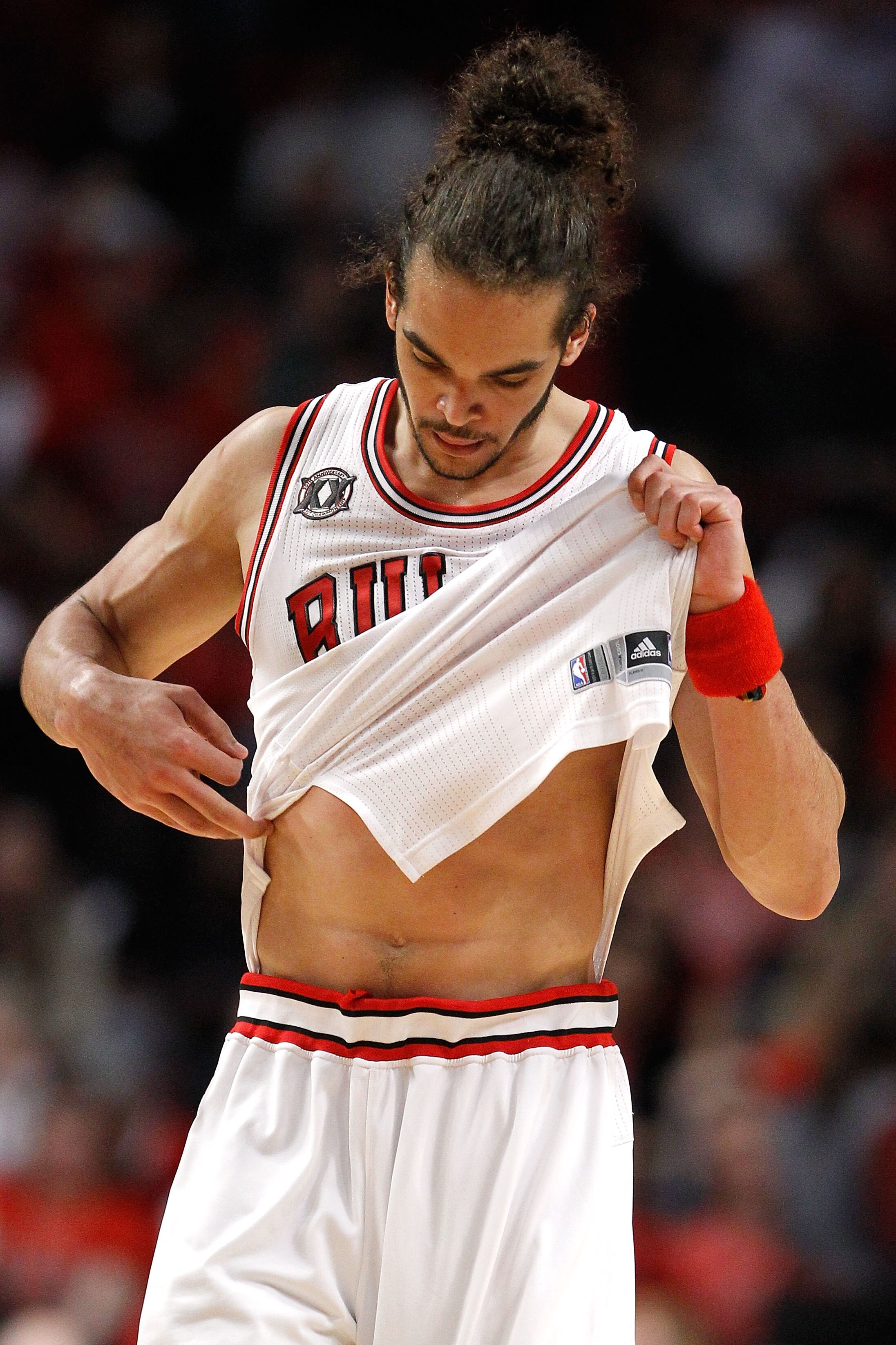 CHICAGO, IL - MAY 18:  Joakim Noah #13 of the Chicago Bulls looks on dejected against the Miami Heat in Game Two of the Eastern Conference Finals during the 2011 NBA Playoffs on May 18, 2011 at the United Center in Chicago, Illinois. The Miami Heat won 85