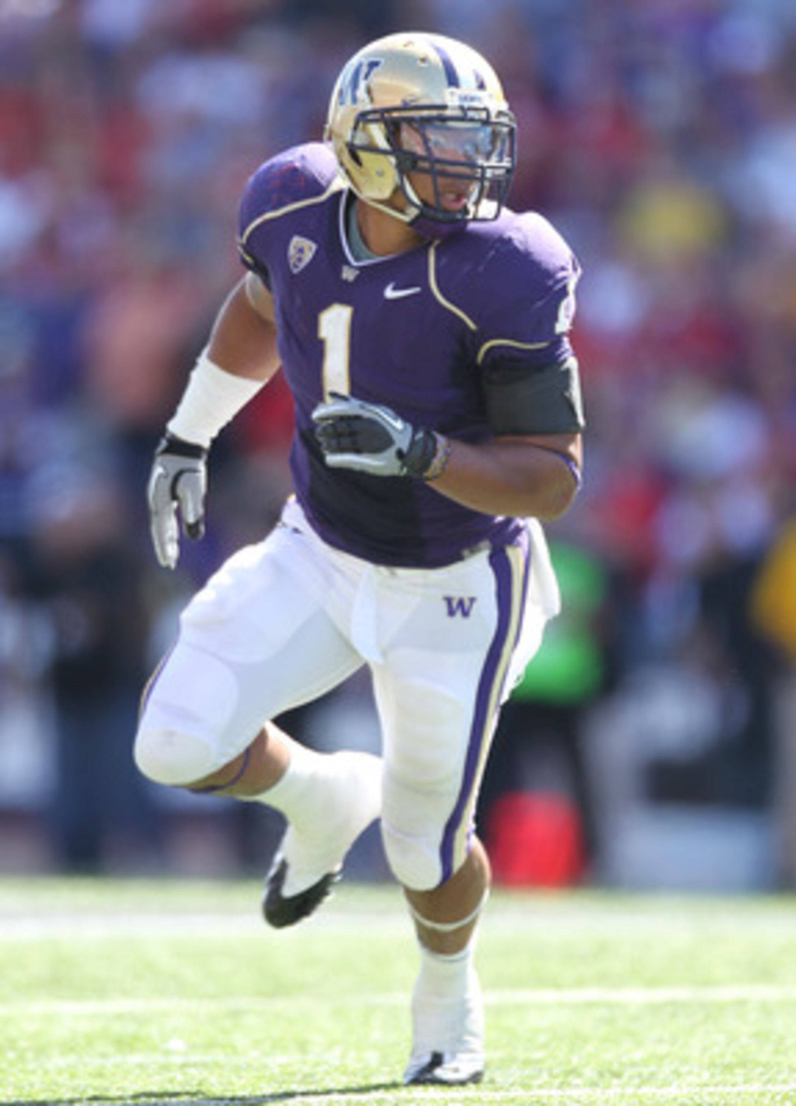 SEATTLE - SEPTEMBER 18: Running back Chris Polk #1 of the Washington Huskies runs a pass pattern against the Nebraska Cornhuskers on September 18, 2010 at Husky Stadium in Seattle, Washington. (Photo by Otto Greule Jr/Getty Images)