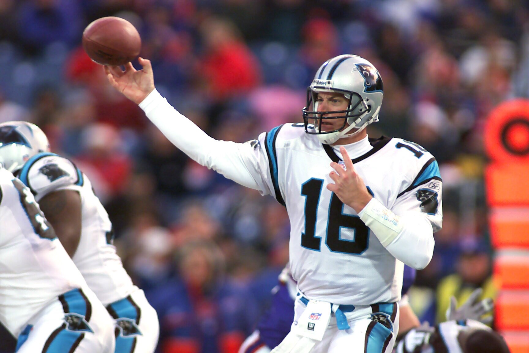 09 December 2001: Chris Weinke # 16 of the Carolina Panthers throws a pass against the Buffalo Bills  during their game at Ralph Wilson Stadium in Orchard Park, New York. Buffalo won 25-24.  DIGITAL IMAGE. Mandatory Credit: Rick Stewart/Allsport