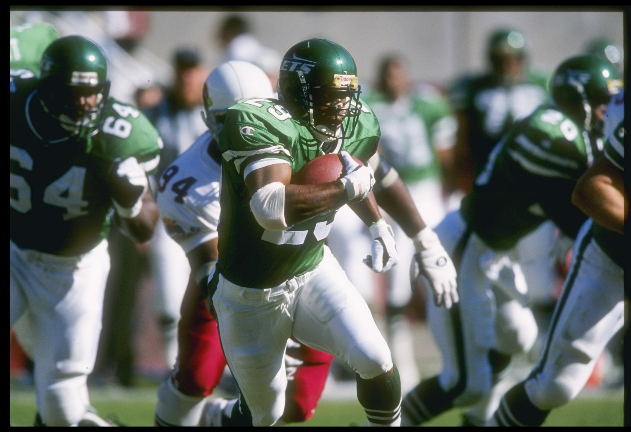 27 Oct 1996:  Defensive tackle Bernard Wilson of the Arizona Cardinals chases after running back Adrian Murrell of the New York Jets during a game at Sun Devil Stadium in Tempe, Arizona.  The Jets won the game 31-21. Mandatory Credit: Stephen Dunn  /Allsp