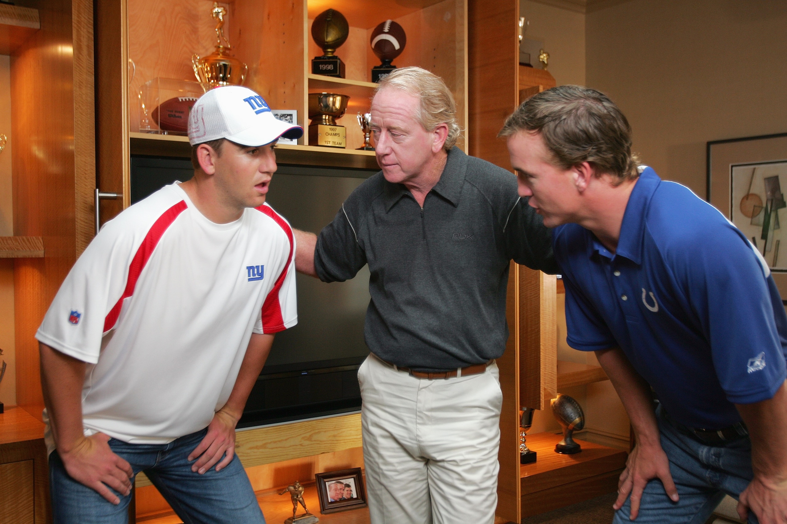 NORTH CALDWELL, NJ - JUNE 26:  (L-R) Eli, Archie and Peyton Manning on the set during a Reebok commercial shoot on June 26, 2006 in North Caldwell, New Jersey.   (Photo by Ezra Shaw/Getty Images for Reebok)