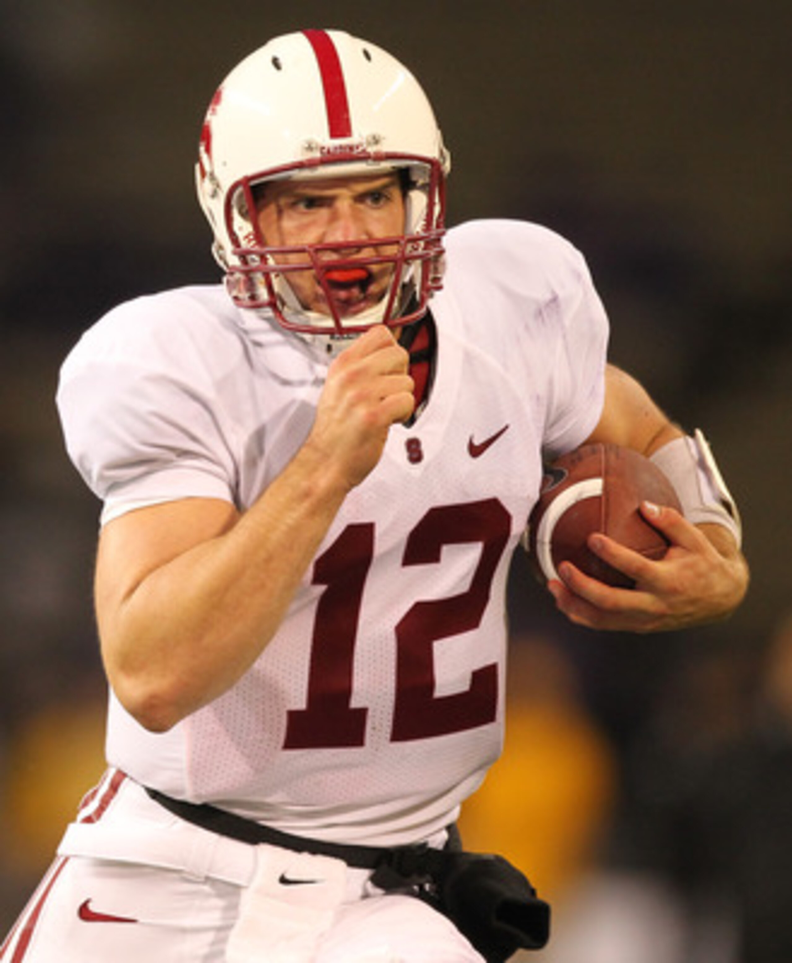 SEATTLE - OCTOBER 30:  Quarterback Andrew Luck #12 of the Stanford Cardinal rushes against the Washington Huskies on October 30, 2010 at Husky Stadium in Seattle, Washington. Stanford won 41-0. (Photo by Otto Greule Jr/Getty Images)