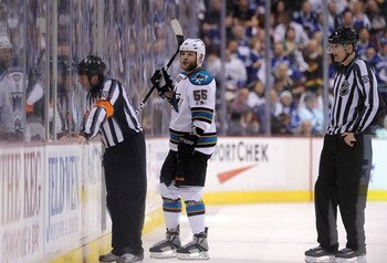 VANCOUVER, CANADA - MAY 18:  Ben Eager #55 of the San Jose Sharks goes to the penalty box after an unsportsmanlike conduct penalty for standing over goaltender Roberto Luongo #1 of the Vancouver Canucks (not in photo) and taunting him in the third period 