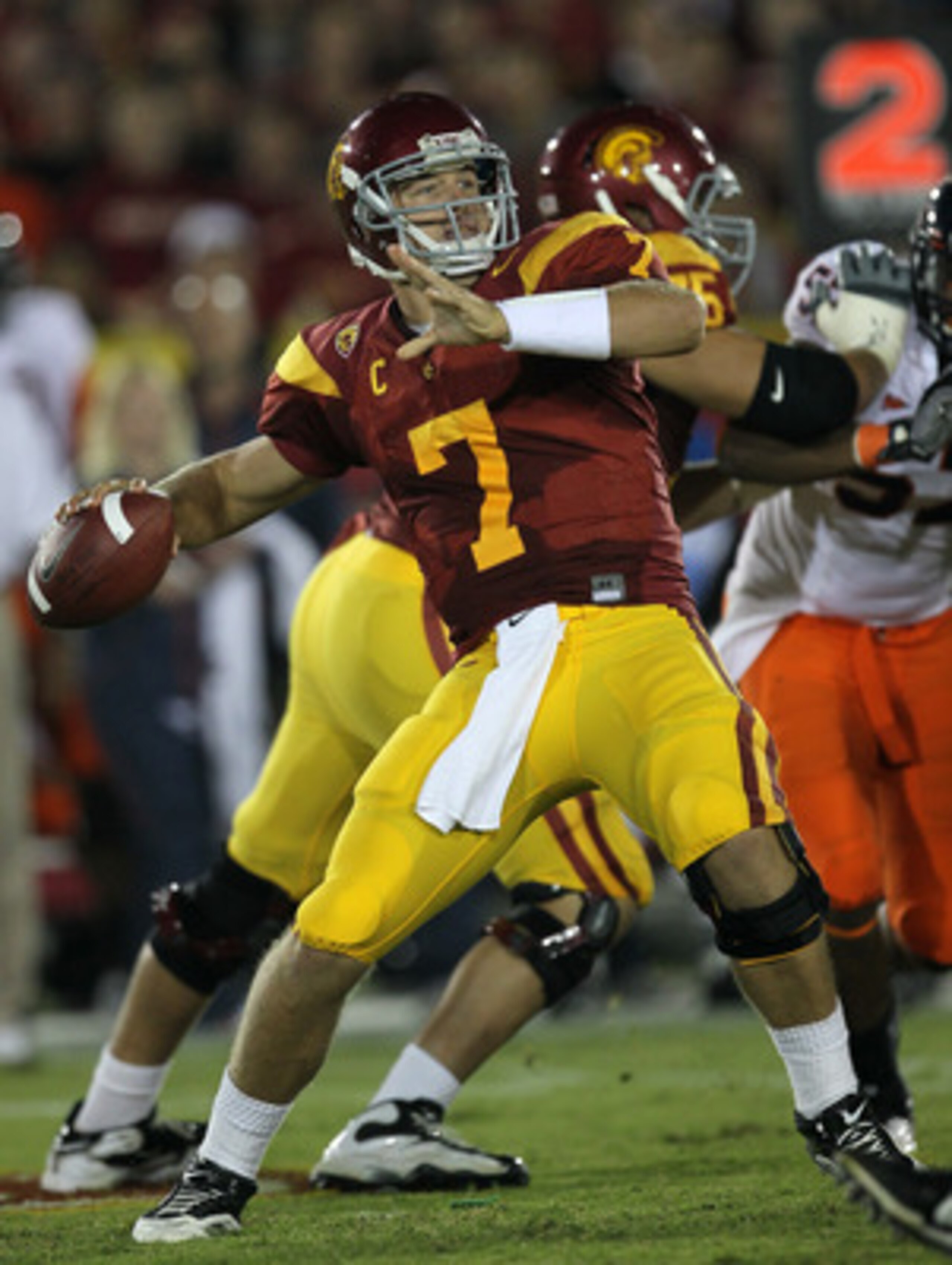 LOS ANGELES, CA - SEPTEMBER 11:  Quarterback Matt Barkley #7 of the USC Trojans throws a pass against the Virginia Cavaliers at Los Angeles Memorial Coliseum on September 11, 2010 in Los Angeles, California. USC won 17-14.  (Photo by Stephen Dunn/Getty Im