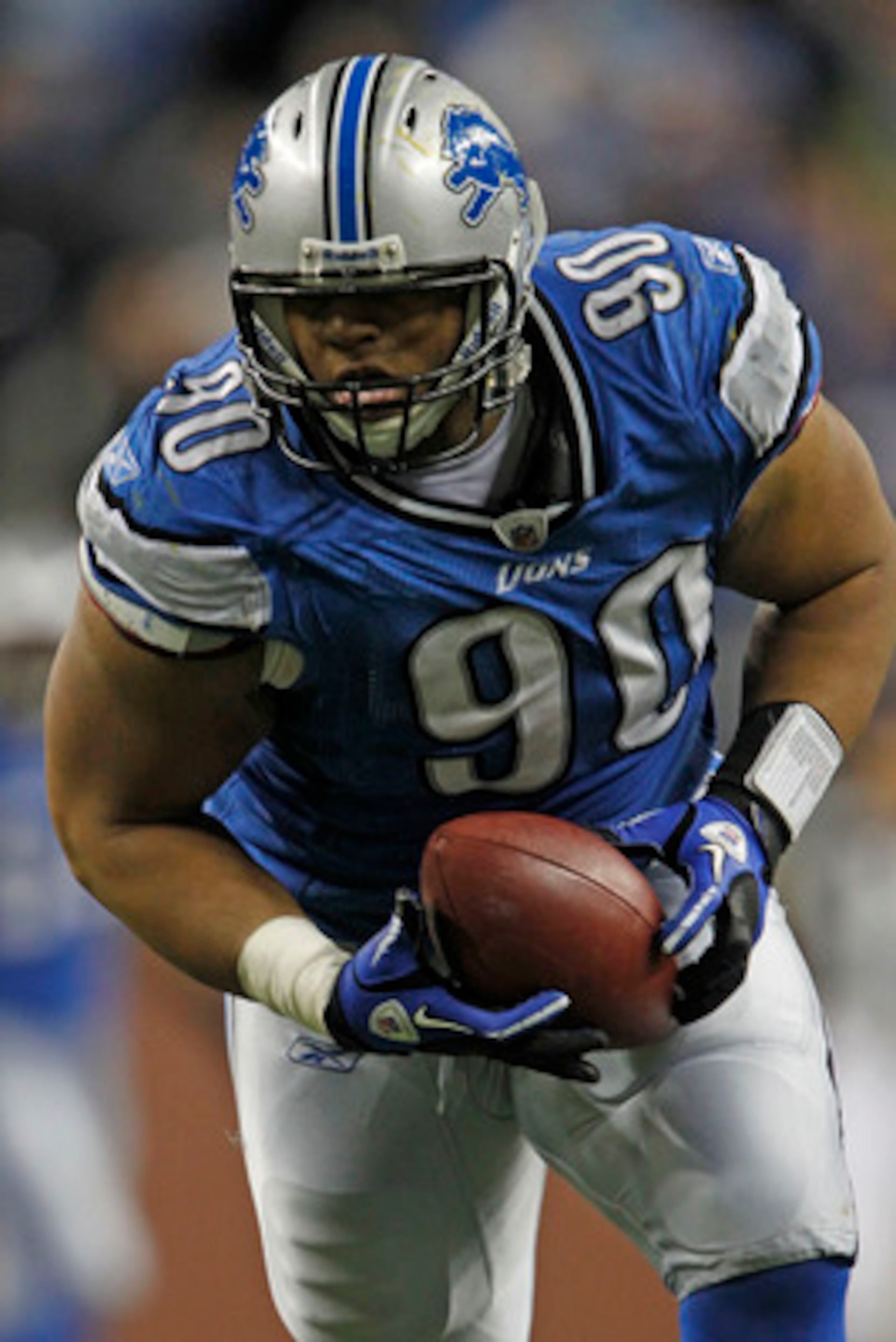 DETROIT - OCTOBER 31:  Ndamukong Suh #90 of the Detroit Lions recovers a late fourth quarter fumble from Rex Grossman #8 of the Washington Redskins an scores a touchdown at Ford Field on October 31, 2010 in Detroit, Michigan. The Lions defeated the Redski