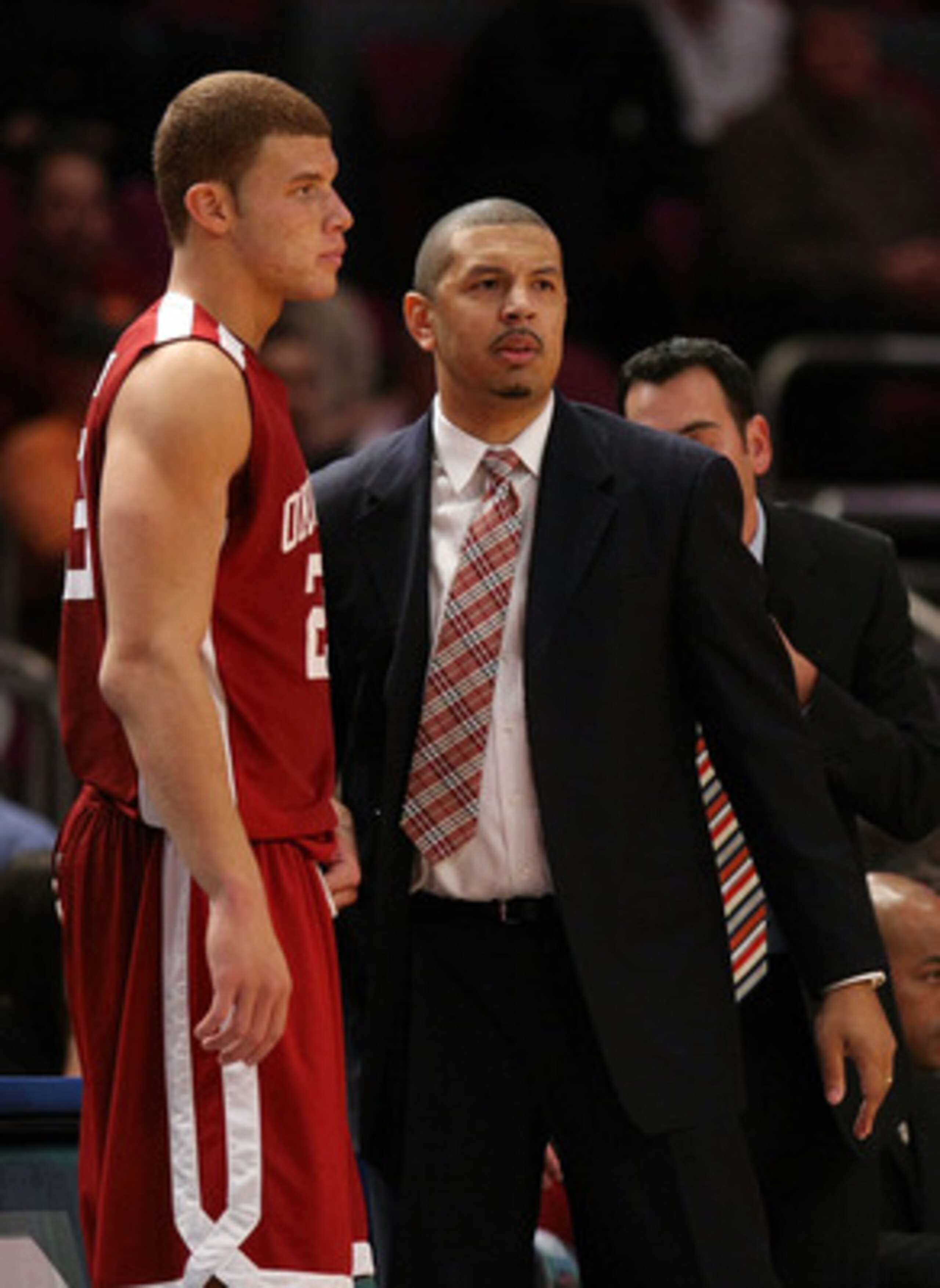 NEW YORK - NOVEMBER 28:  Blake Griffin #23 of the Oklahoma Sooners talks with head coach Jeff Capel against the Purdue Boilermakers during the Championship game of the Pre-Season NIT tournament on November 28, 2008 at Madison Square Garden in New York Cit
