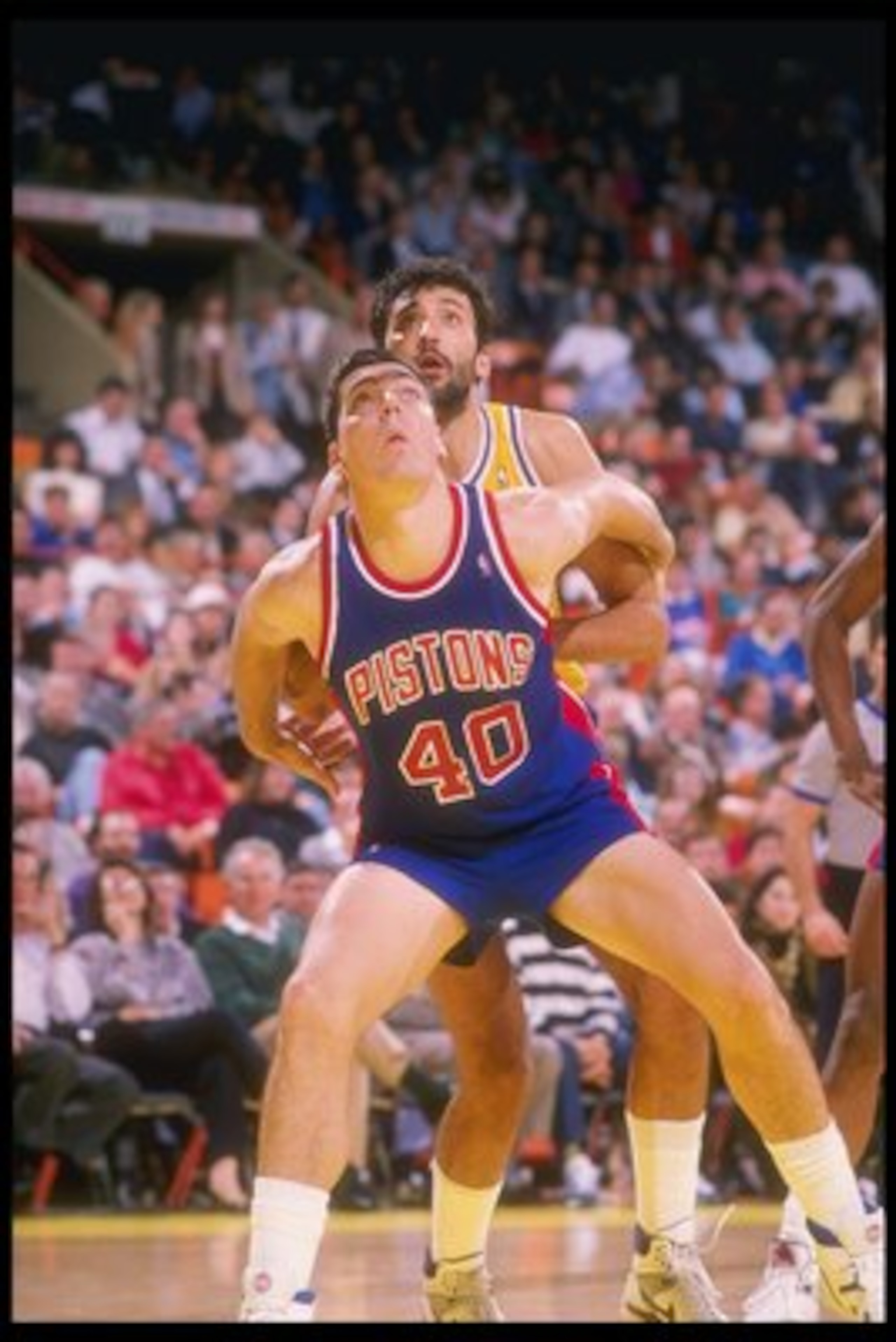 1989-1990: Bill Laimbeer of the Detroit Pistons looks for the ball during a game. Mandatory Credit: Mike Powell /Allsport Mandatory Credit: Mike Powell /Allsport 1989-1990: Bill Laimbeer of the Detroit Pistons looks for the ball during a game. Mandatory Credit: Mike Powell /Allsport Mandatory Credit: Mike Powell /Allsport