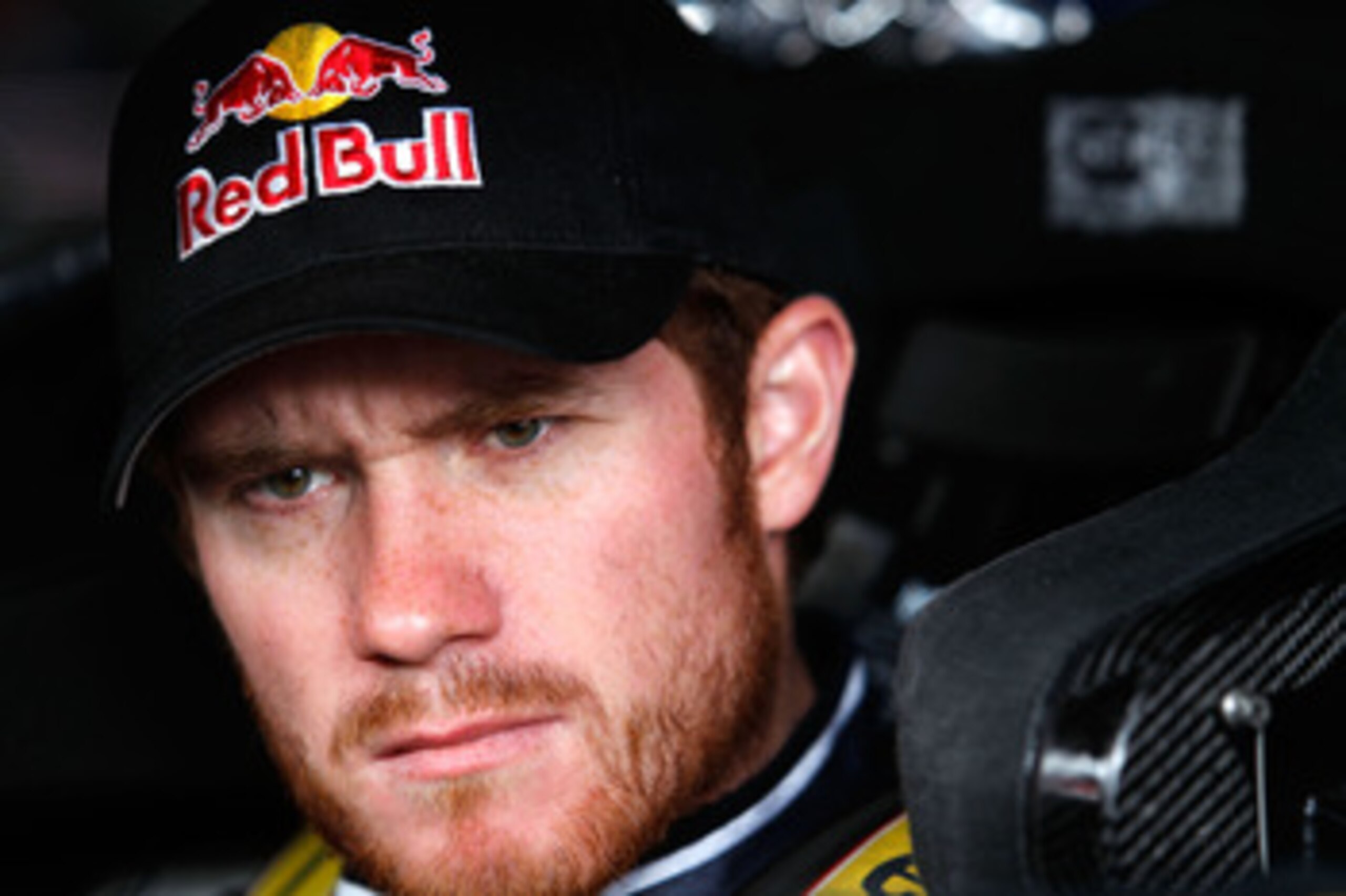 DOVER, DE - MAY 13:  Brian Vickers, driver of the #83 Red Bull Toyota, sits in his car during practice for the NASCAR Sprint Cup Series FedEx 400 Benefiting Autism Speaks at Dover International Speedway on May 13, 2011 in Dover, Delaware.  (Photo by Todd 