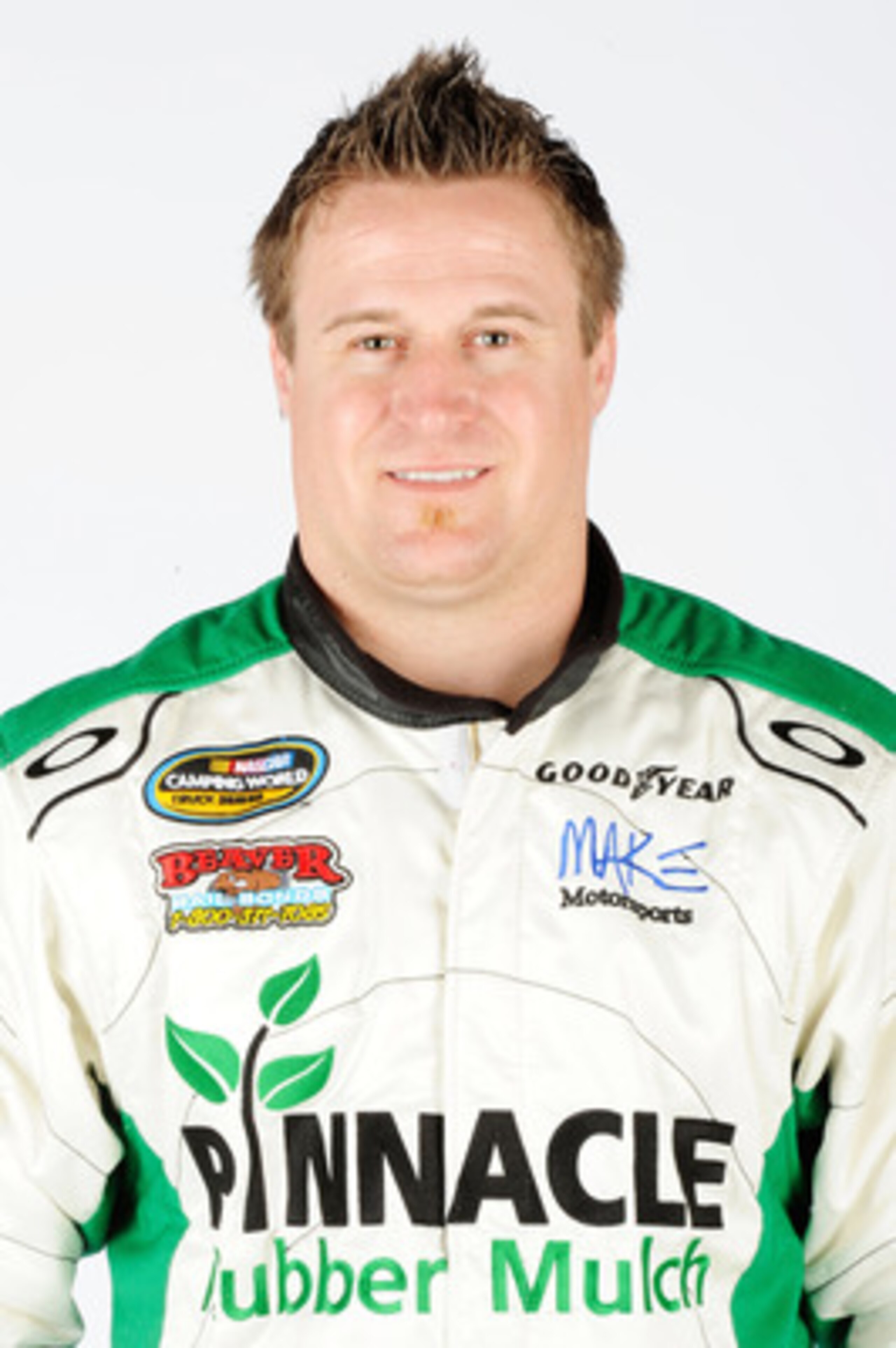 DAYTONA BEACH, FL - FEBRUARY 16:  T.J. Bell, driver of the #50 Liberty Recycling/Pinnacle Mulch Chevrolet, poses during the 2011 NASCAR Camping World Truck Series Portraits at Daytona International Speedway on February 16, 2011 in Daytona Beach, Florida. 