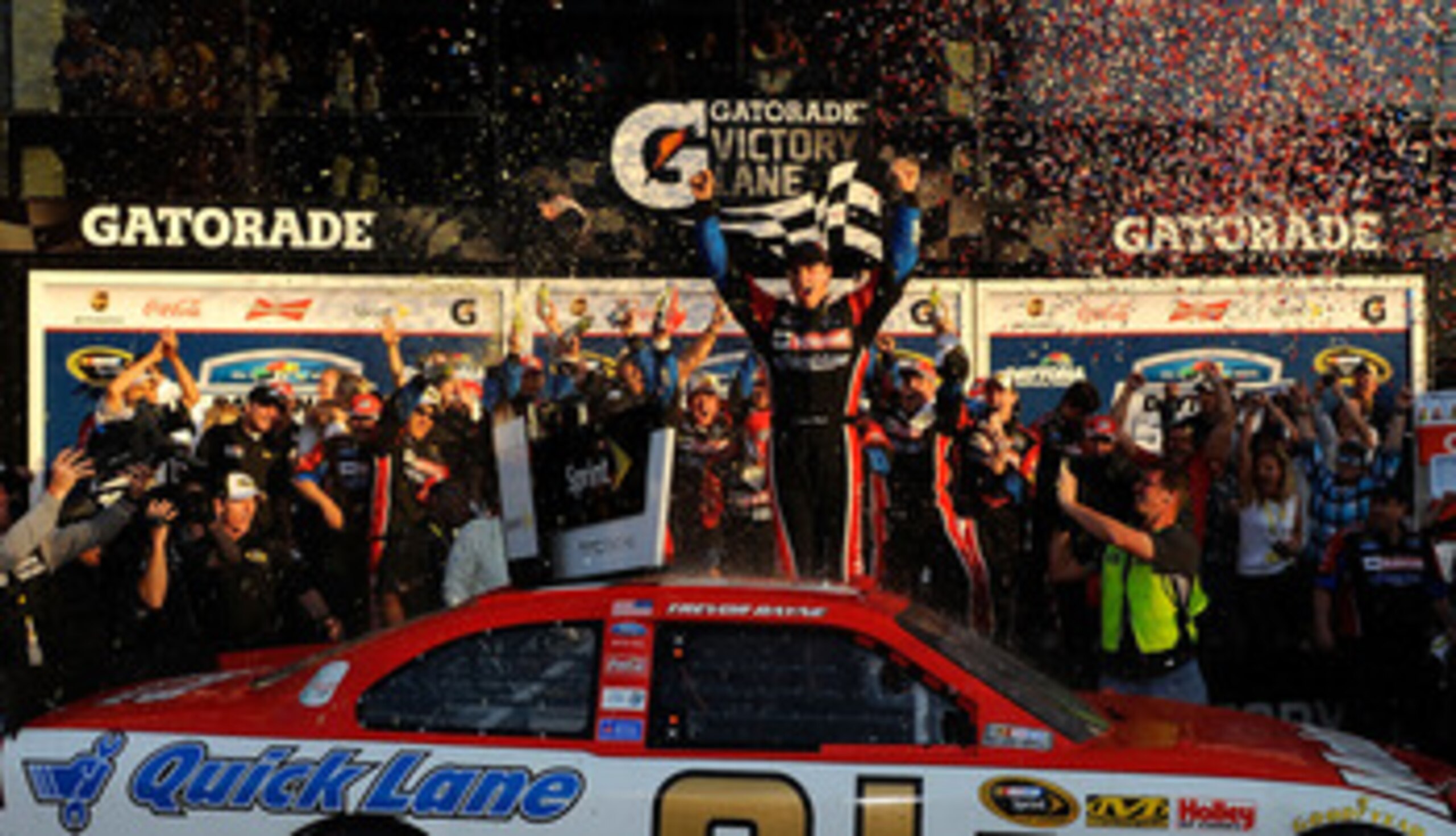 DAYTONA BEACH, FL - FEBRUARY 20:  Trevor Bayne, driver of the #21 Motorcraft/Quick Lane Ford, celebrates in Victory Lane after winning the NASCAR Sprint Cup Series Daytona 500 at Daytona International Speedway on February 20, 2011 in Daytona Beach, Florid