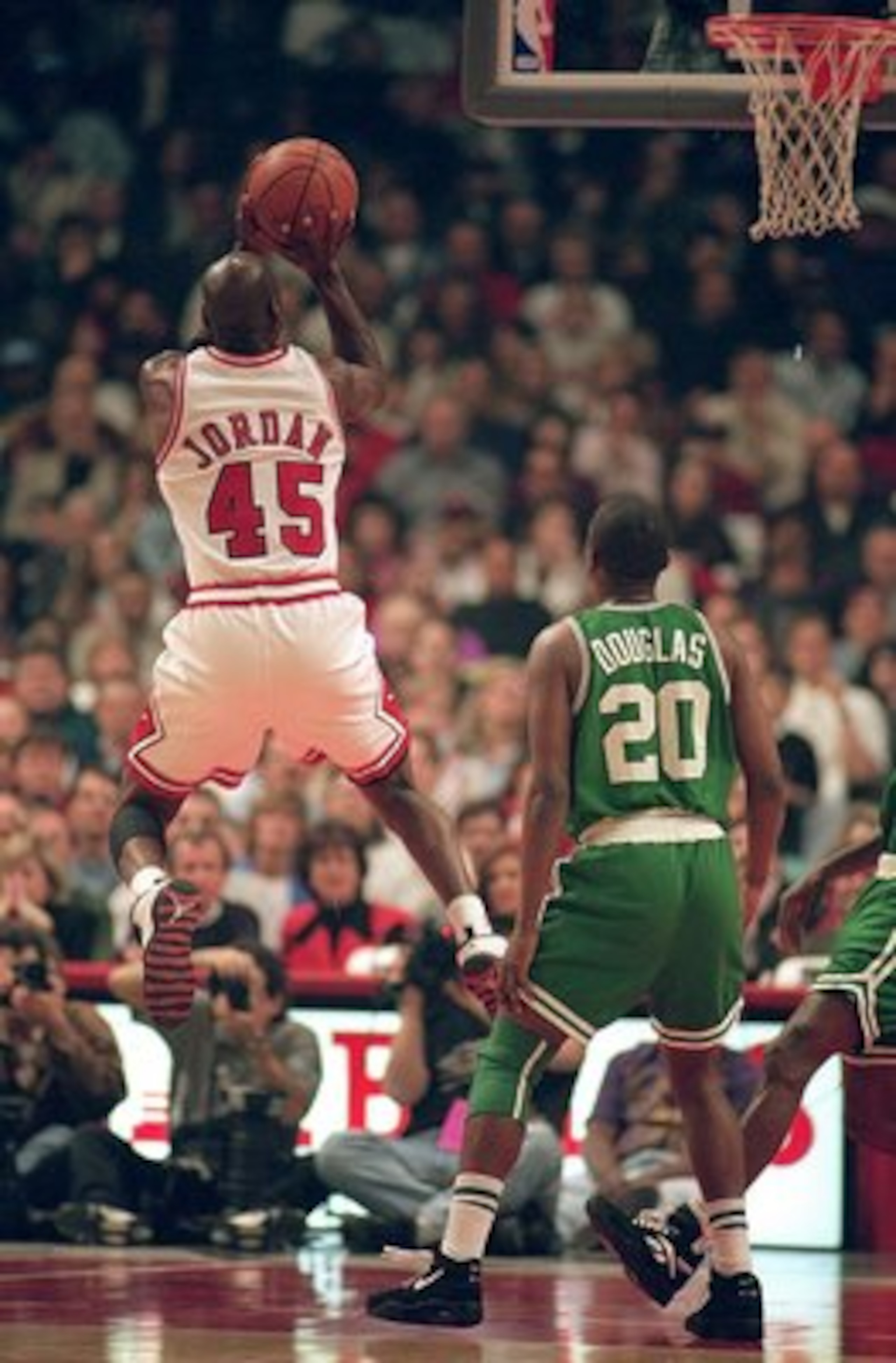 CHICAGO - MARCH 30: Michael Jordan #45 of the Chicago Bulls jumps to shoot the ball during the game against the Boston Celtics at the United Center on March 30, 1995 in Chicago, Illinois. The Bulls defeated the Celtics 100-82. NOTE TO USER: User expre CHICAGO - MARCH 30: Michael Jordan #45 of the Chicago Bulls jumps to shoot the ball during the game against the Boston Celtics at the United Center on March 30, 1995 in Chicago, Illinois. The Bulls defeated the Celtics 100-82. NOTE TO USER: User expre