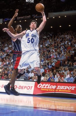 16 Feb 2001:  Mike Miller #50 of the Orlando Magic leaps for the basket during the game against the Houston Rockets at the Compaq Center in Houston, Texas.  The Magic defeated the Rockets 108-93.  NOTE TO USER: It is expressly understood that the only rig