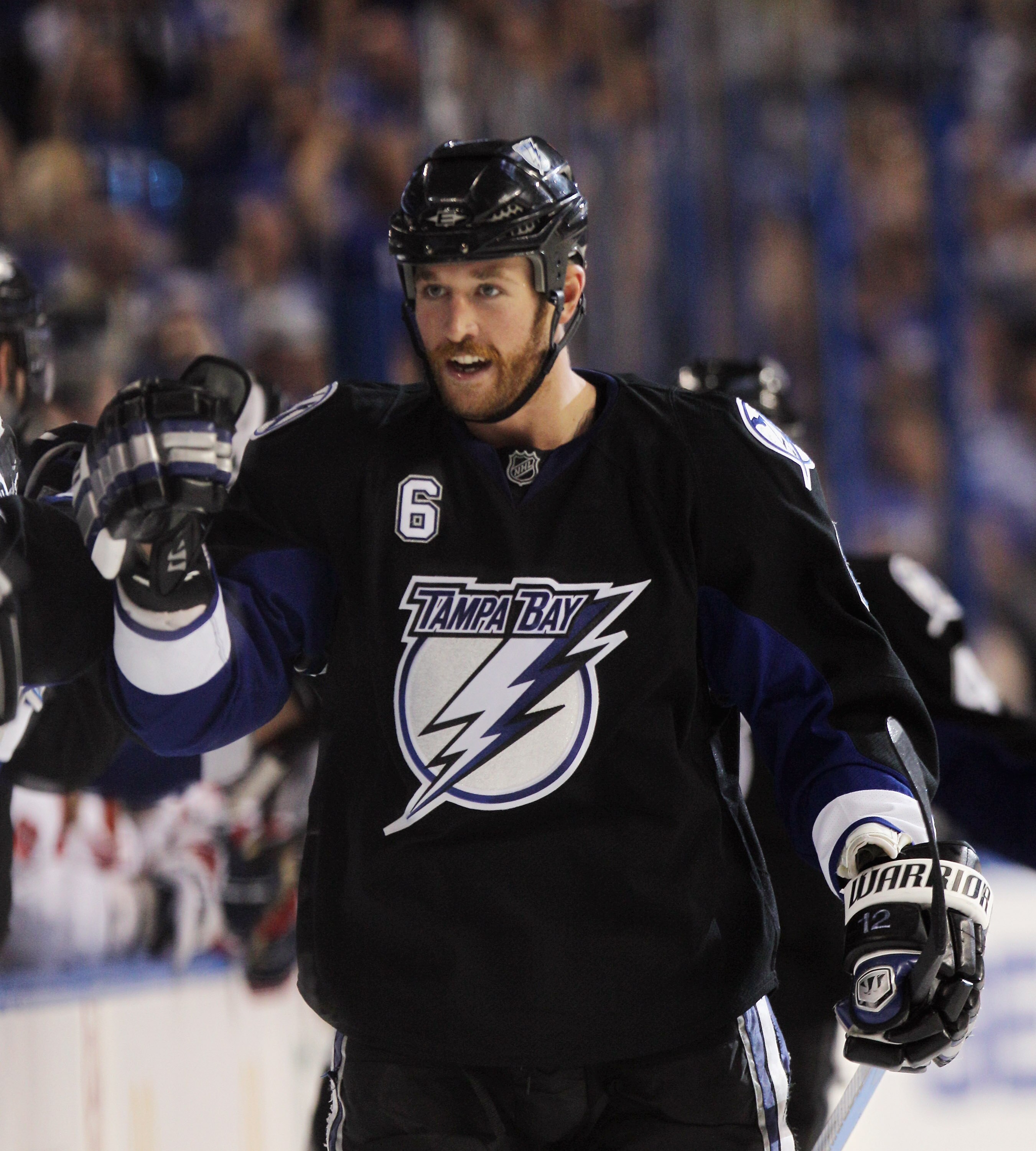 TAMPA, FL - MAY 03:  Ryan Malone #6 of the Tampa Bay Lightning returns to the bench following his game winning goal at 5:47 of the third period against the Washington Capitals in Game Three of the Eastern Conference Semifinals during the 2011 NHL Stanley
