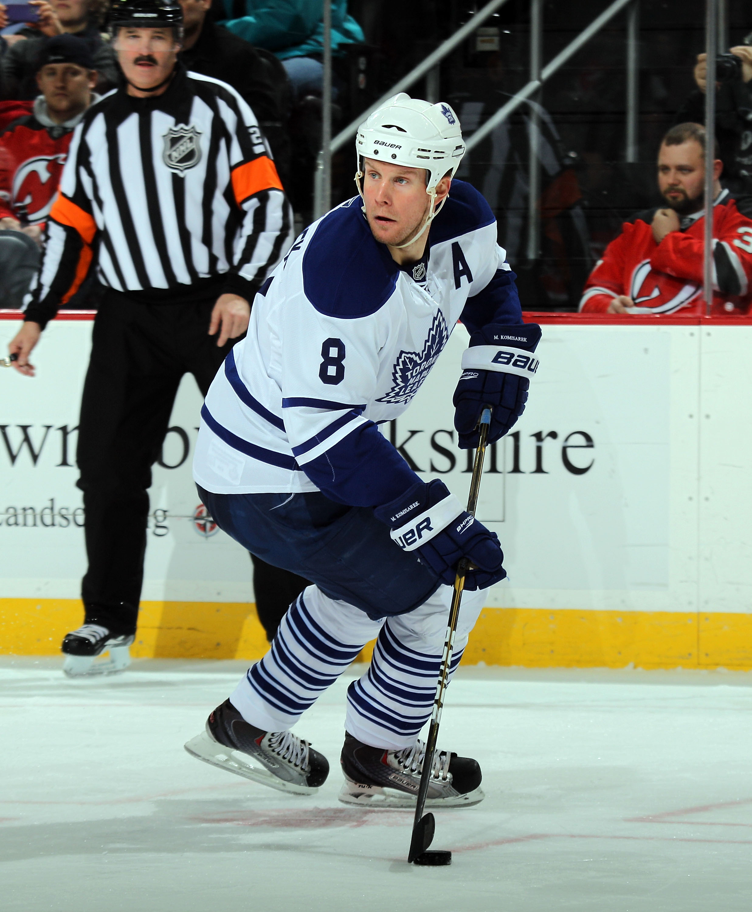 NEWARK, NJ - APRIL 06: Mike Komisarek #8 of the Toronto Maple Leafs skates against the New Jersey Devils at the Prudential Center on April 6, 2011 in Newark, New Jersey.  (Photo by Bruce Bennett/Getty Images)