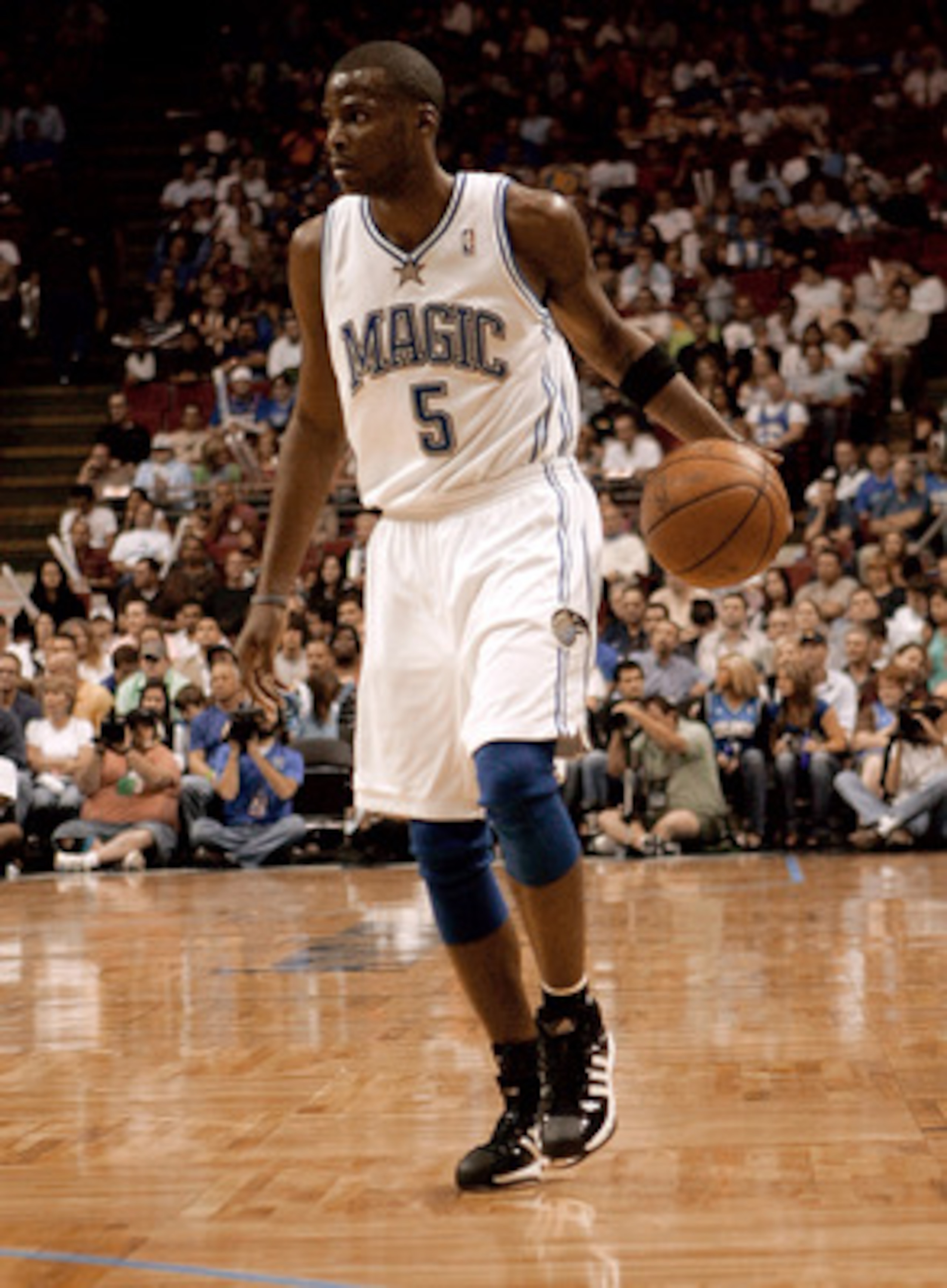 ORLANDO, FL - FEBRUARY 22:  Keyon Dooling, #5 of the Orlando Magic, sets up the offense in a game against the Philadelphia 76ers at Amway Arena on February 22, 2008 in Orlando Florida. NOTE TO USER: User expressly acknowledges and agrees that, by download