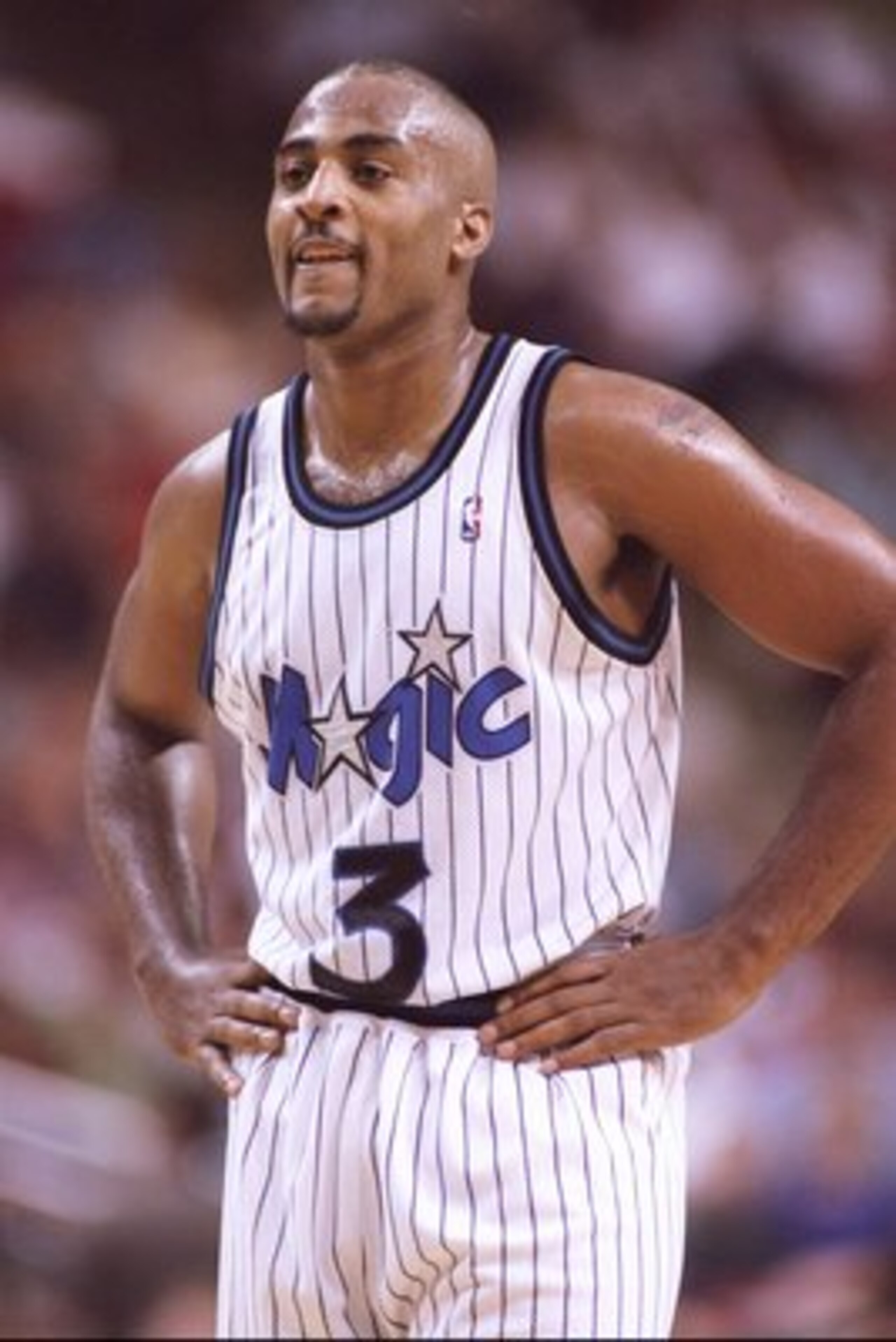 27 Nov 1995:  Forward Dennis Scott of the Orlando Magic looks on during a game against the Detroit Pistons at the Orlando Arena in Orlando, Florida.  The Magic won the game, 96-95. Mandatory Credit: Allsport  /Allsport