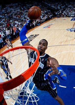 ATLANTA, GA - APRIL 28:  Dwight Howard #12 of the Orlando Magic dunks against the Atlanta Hawks during Game Six of the Eastern Conference Quarterfinals in the 2011 NBA Playoffs at Philips Arena on April 28, 2011 in Atlanta, Georgia.  NOTE TO USER: User ex