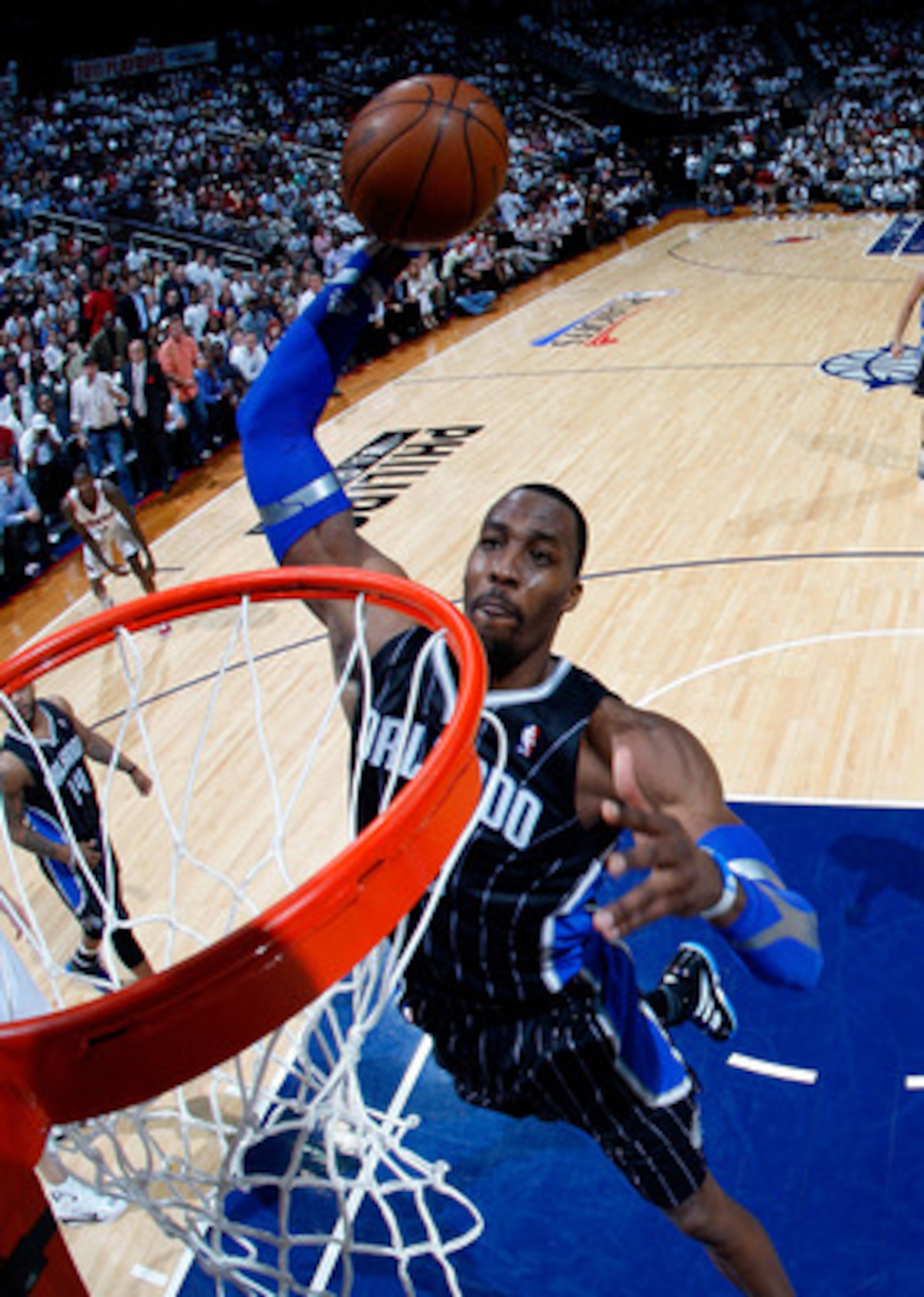 ATLANTA, GA - APRIL 28:  Dwight Howard #12 of the Orlando Magic dunks against the Atlanta Hawks during Game Six of the Eastern Conference Quarterfinals in the 2011 NBA Playoffs at Philips Arena on April 28, 2011 in Atlanta, Georgia.  NOTE TO USER: User ex