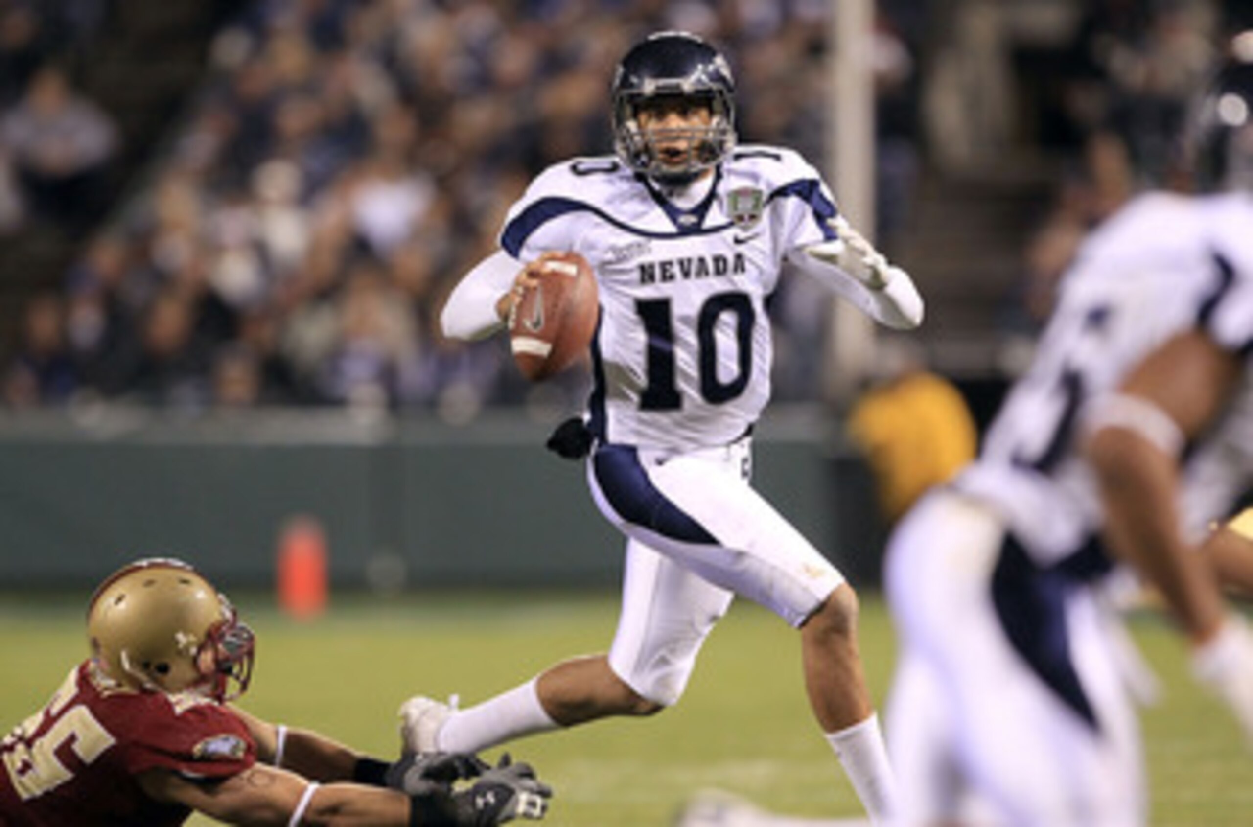 SAN FRANCISCO, CA - JANUARY 09: Colin Kaepernick #10 of the Nevada Wolf Pack looks to pass the ball against Boston College during the Kraft Fight Hunger Bowl at AT&T Park on January 9, 2011 in San Francisco, California. (Photo by Ezra Shaw/Getty Images) SAN FRANCISCO, CA - JANUARY 09: Colin Kaepernick #10 of the Nevada Wolf Pack looks to pass the ball against Boston College during the Kraft Fight Hunger Bowl at AT&T Park on January 9, 2011 in San Francisco, California. (Photo by Ezra Shaw/Getty Images)