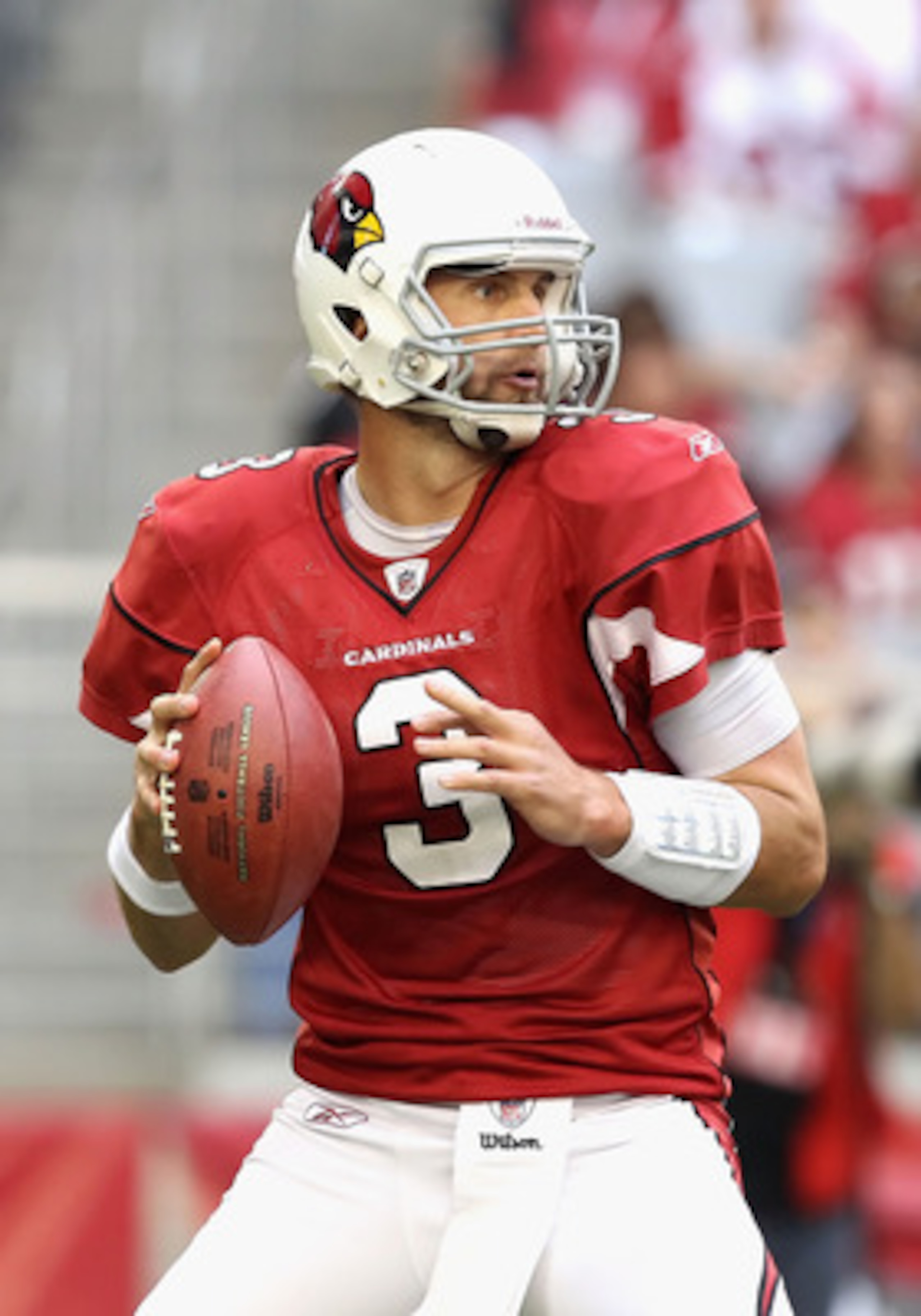 GLENDALE, AZ - DECEMBER 05:  Quarterback Derek Anderson #3 of the Arizona Cardinals scrambles to pass the football during the NFL game against the St. Louis Rams at the University of Phoenix Stadium on December 5, 2010 in Glendale, Arizona. The Rams defea