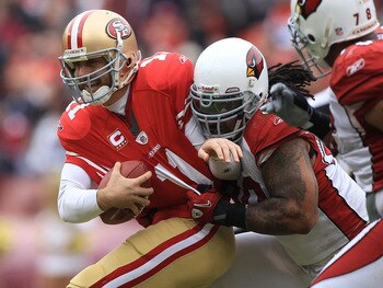 SAN FRANCISCO, CA - JANUARY 02: Alex Smith #11 of the San Francisco 49ers is sacked by Darnell Dockett #90 of the Arizona Cardinals during an NFL game at Candlestick Park on January 2, 2011 in San Francisco, California. (Photo by Jed Jacobsohn/Getty I SAN FRANCISCO, CA - JANUARY 02: Alex Smith #11 of the San Francisco 49ers is sacked by Darnell Dockett #90 of the Arizona Cardinals during an NFL game at Candlestick Park on January 2, 2011 in San Francisco, California. (Photo by Jed Jacobsohn/Getty I