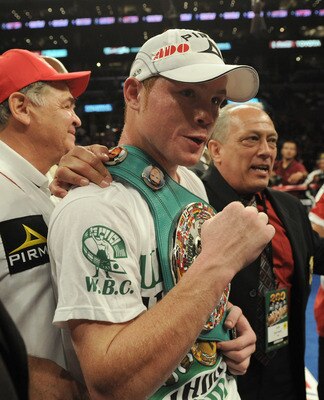 LOS ANGELES, CA - SEPTEMBER 18:  Saul Alvarez of Mexico celebrates his knockout of Carlos Baldomir of Argentina during the sixth round in the WBC Super Welterweight Silver Title fight at Staples Center on September 18, 2010 in Los Angeles, California.  (P