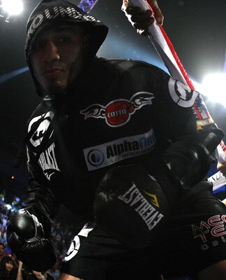 LAS VEGAS - MARCH 12:  Miguel Cotto enters the ring for his fight against Ricardo Mayorga for the WBA Super Welterweight title bout at the MGM Grand Garden Arena on March 12, 2011 in Las Vegas, Nevada.  (Photo by Al Bello/Getty Images)