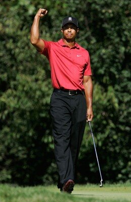 LEMONT, IL - SEPTEMBER 9:  Tiger Woods pumps his fist after making a birdie putt on the 12th hole during the final round of BMW Championship, the third event of the new PGA TOUR Playoffs for the FedExCup at Cog Hill Golf and Country Club September 9, 2007