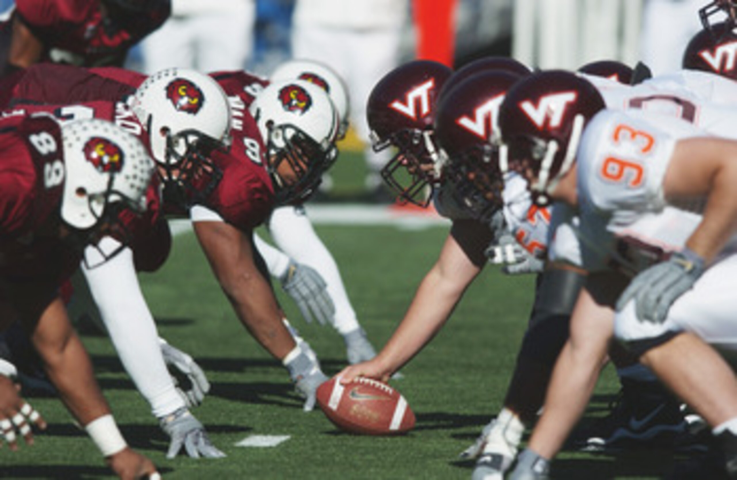 PHILADELPHIA - NOVEMBER 10:  The defensive line of the Temple Owls lines up against the offensive line of the Virginia Tech Hokies during the Big East Conference football game on November 10, 2001 at Veterans Stadium in Philadelphia, Pennsylvania. Virgini