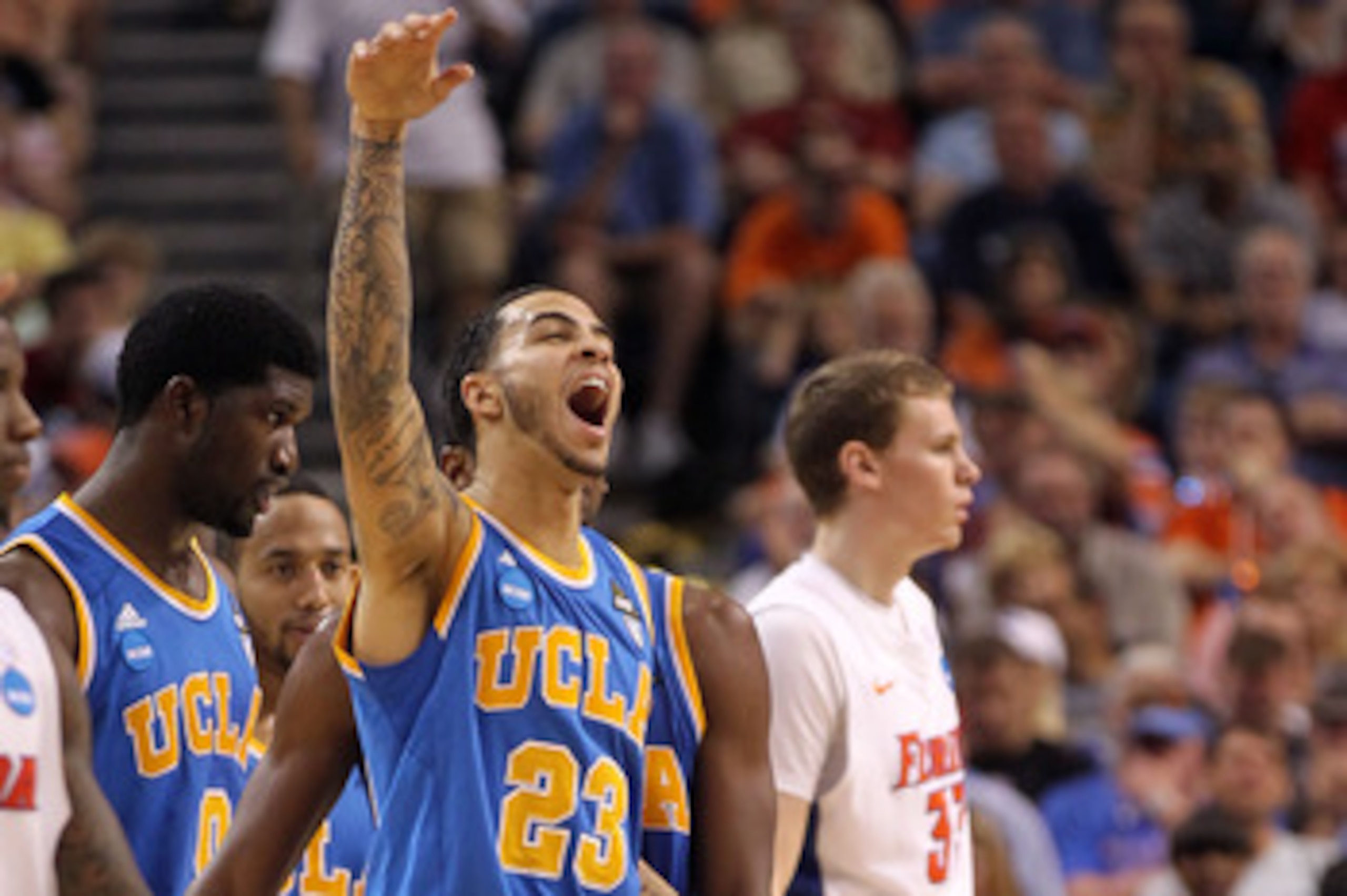 TAMPA, FL - MARCH 19:  Tyler Honeycutt #23 of the UCLA Bruins reacts against the Florida Gators during the third round of the 2011 NCAA men's basketball tournament at St. Pete Times Forum on March 19, 2011 in Tampa, Florida.  (Photo by Mike Ehrmann/Getty