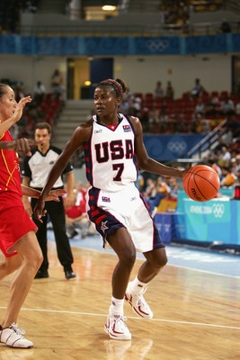 ATHENS - AUGUST 20:  Sheryl Swoopes #7 of the USA moves the ball against Spain in the women's basketball preliminary game on August 20, 2004 during the Athens 2004 Summer Olympic Games at the Indoor Arena of the Helliniko Olympic Complex in Athens, Greece