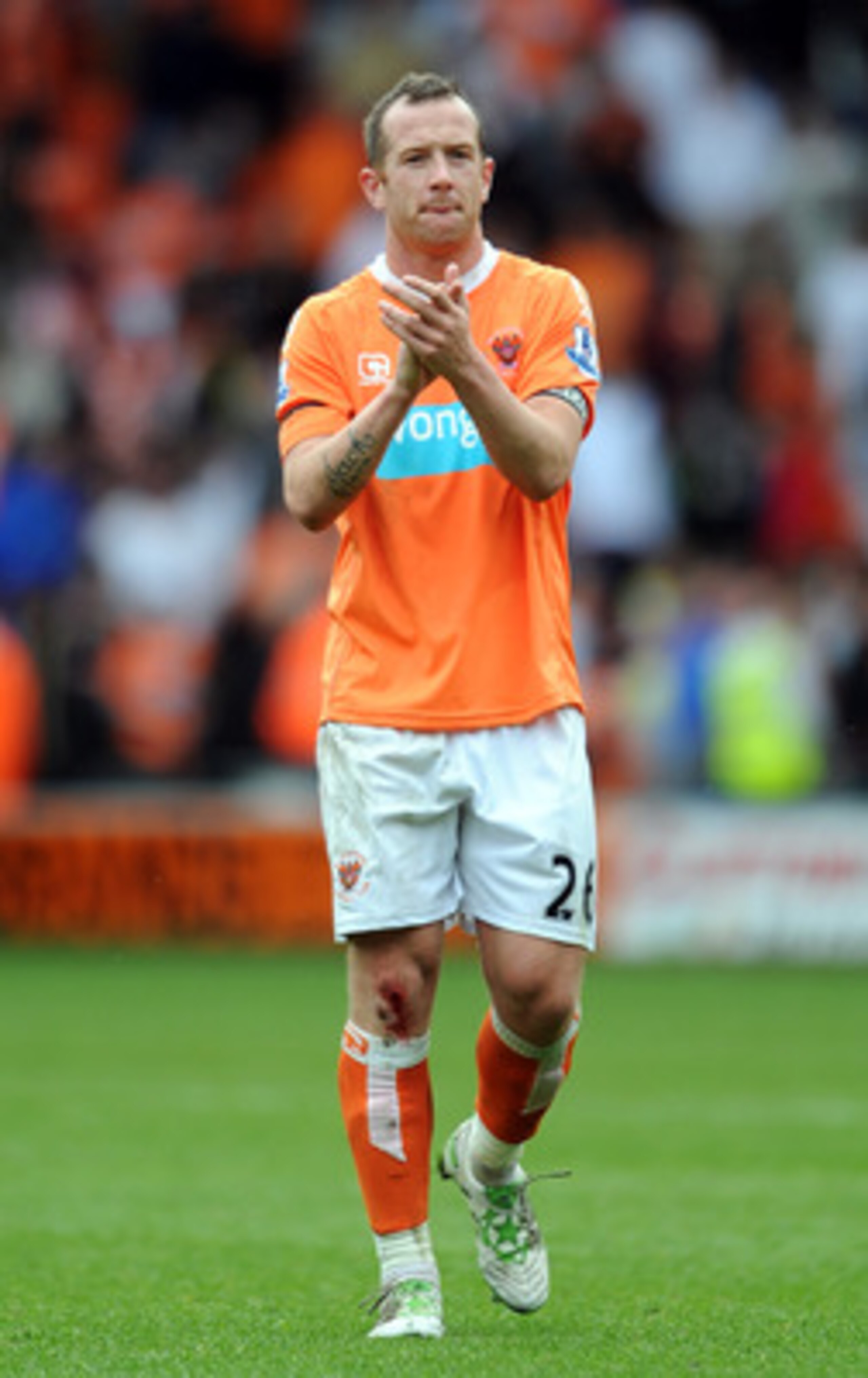 BLACKPOOL, ENGLAND - APRIL 23:  Charlie Adam of Blackpool applauds the supporters at full-time following the Barclays Premier League match between Blackpool and Newcastle United at Bloomfield Road on April 23, 2011 in Blackpool, England.  (Photo by Chris 