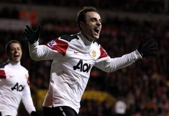 BLACKPOOL, ENGLAND - JANUARY 25:   Dimitar Berbatov of Manchester United celebrates scoring his team's third goal during the Barclays Premier League match between Blackpool and Manchester United at Bloomfield Road on January 25, 2011 in Blackpool, England