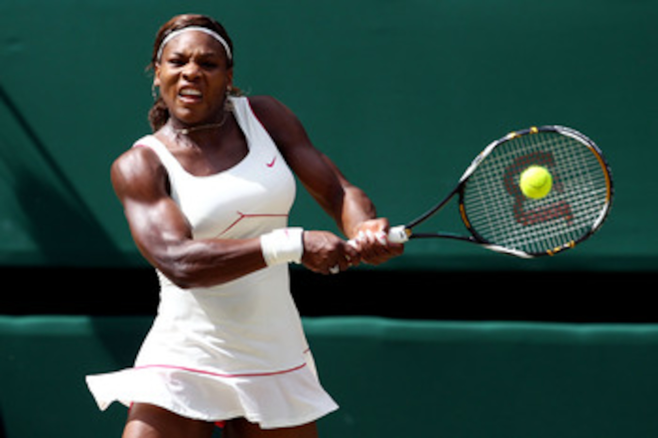 LONDON, ENGLAND - JULY 03:  Serena Williams of USA returns a shot during the Ladies Singles Final Match against Vera Zvonareva of Russia on Day Twelve of the Wimbledon Lawn Tennis Championships at the All England Lawn Tennis and Croquet Club on July 3, 20