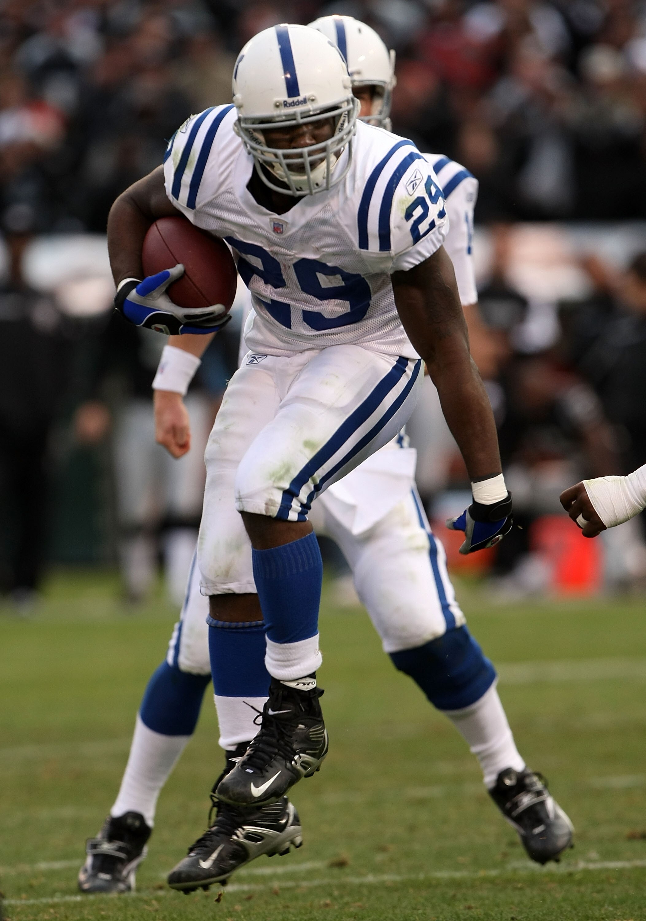 OAKLAND, CA - DECEMBER 16:  Running back Joseph Adai #29 of the Indianapolis Colts carries the ball against the Oakland Raiders at McAfee Coliseum December 16, 2007 in Oakland, California. The Colts won 21-14.  (Photo by Stephen Dunn/Getty Images)