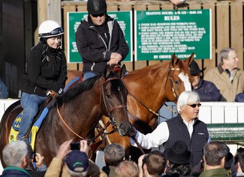 LOUISVILLE, KY - MAY 05: Trainer Bob Baffert leads his  Kentucky Derby entrant Midnight Interlude to the track in preparation for the 137th Kentucky Derby at Churchill Downs on May 5, 2011 in Louisville, Kentucky.  (Photo by Rob Carr/Getty Images)