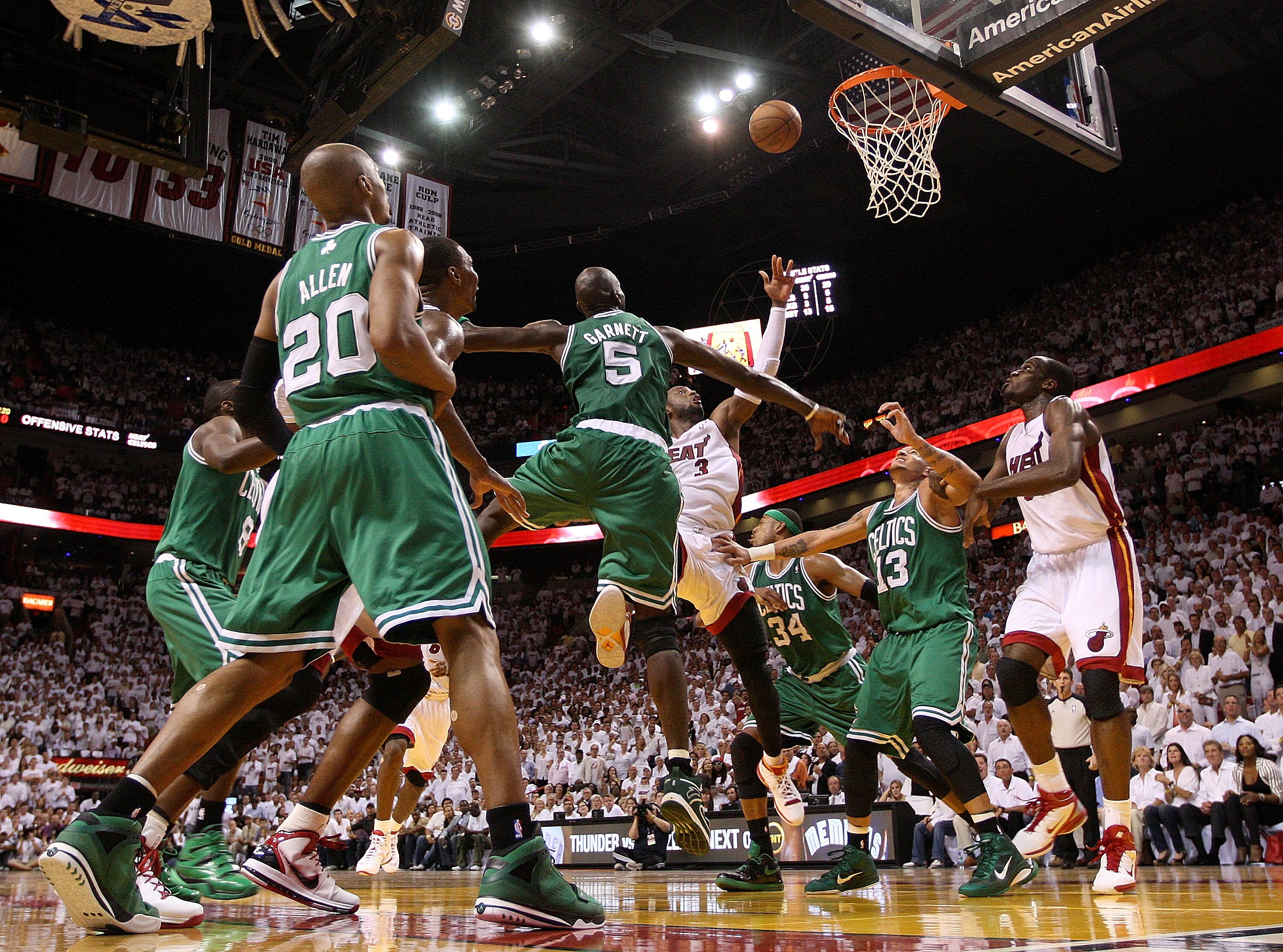 MIAMI, FL - MAY 11:  Dwyane Wade #3 of the Miami Heat shoots over Kevin Garnett #5 of the Boston Celtics during Game Five of the Eastern Conference Semifinals of the 2011 NBA Playoffs at American Airlines Arena on May 11, 2011 in Miami, Florida. NOTE TO U