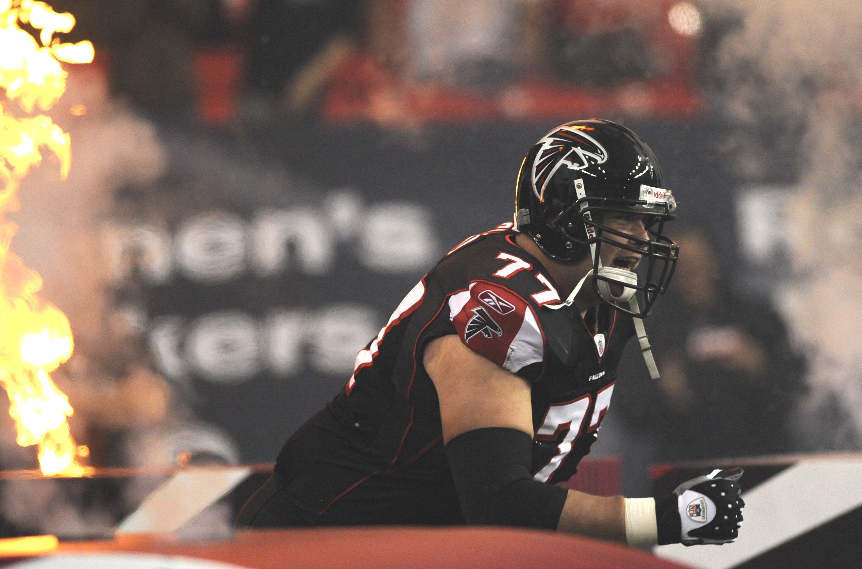 ATLANTA - NOVEMBER 23: Tackle Tyson Clabo #77 of the Atlanta Falcons enters the field before play against the Carolina Panthers at the Georgia Dome on November 23, 2008 in Atlanta, Georgia.  (Photo by Al Messerschmidt/Getty Images)