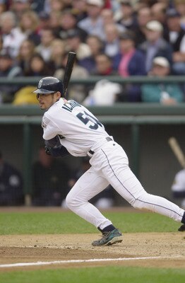 SEATTLE - OCTOBER 15:  Ichiro Suzuki #52 of the Seattle Mariners makes his way to first base during Game 2 of the American League Division Series against the Cleveland Indians on October 15, 2001 at Safeco Field in Seattle, Washington.  The Mariners won 5