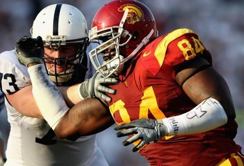 PASADENA, CA - JANUARY 01:  Defensive end Kyle Moore #84 of the USC Trojans battles for position during the 95th Rose Bowl Game presented by Citi against the Penn State Nittany Lions at the Rose Bowl on January 1, 2009 in Pasadena, California. The Trojans
