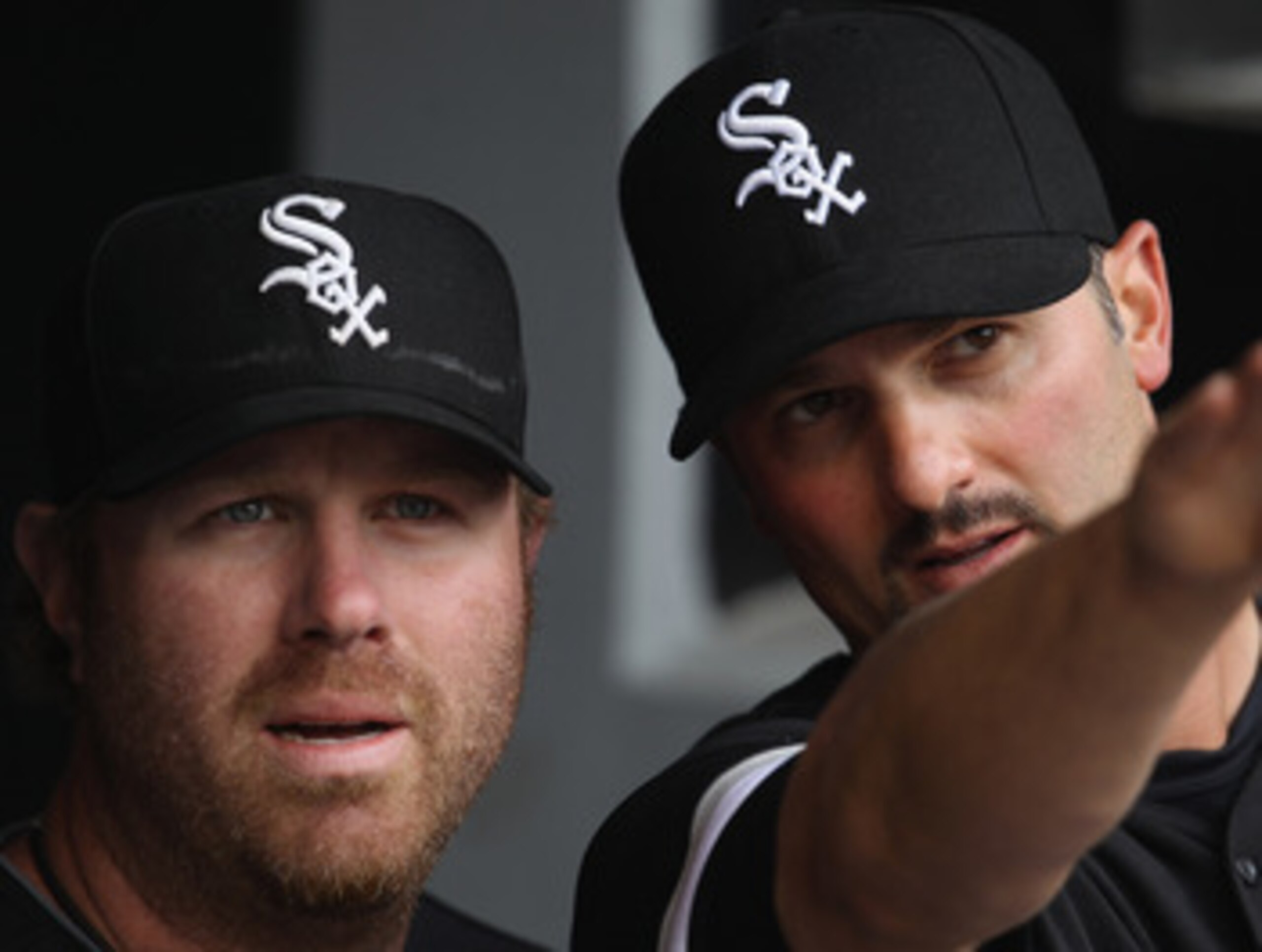 CHICAGO, IL - APRIL 07: Paul Konerko #14 of the Chicago White Sox (R) talks about the stadium to teammate Adam Dunn #32 before the home opener against the Tampa Bay Rays at U.S. Cellular Field on April 7, 2011 in Chicago, Illinois. (Photo by Jonathan Dani CHICAGO, IL - APRIL 07: Paul Konerko #14 of the Chicago White Sox (R) talks about the stadium to teammate Adam Dunn #32 before the home opener against the Tampa Bay Rays at U.S. Cellular Field on April 7, 2011 in Chicago, Illinois. (Photo by Jonathan Dani