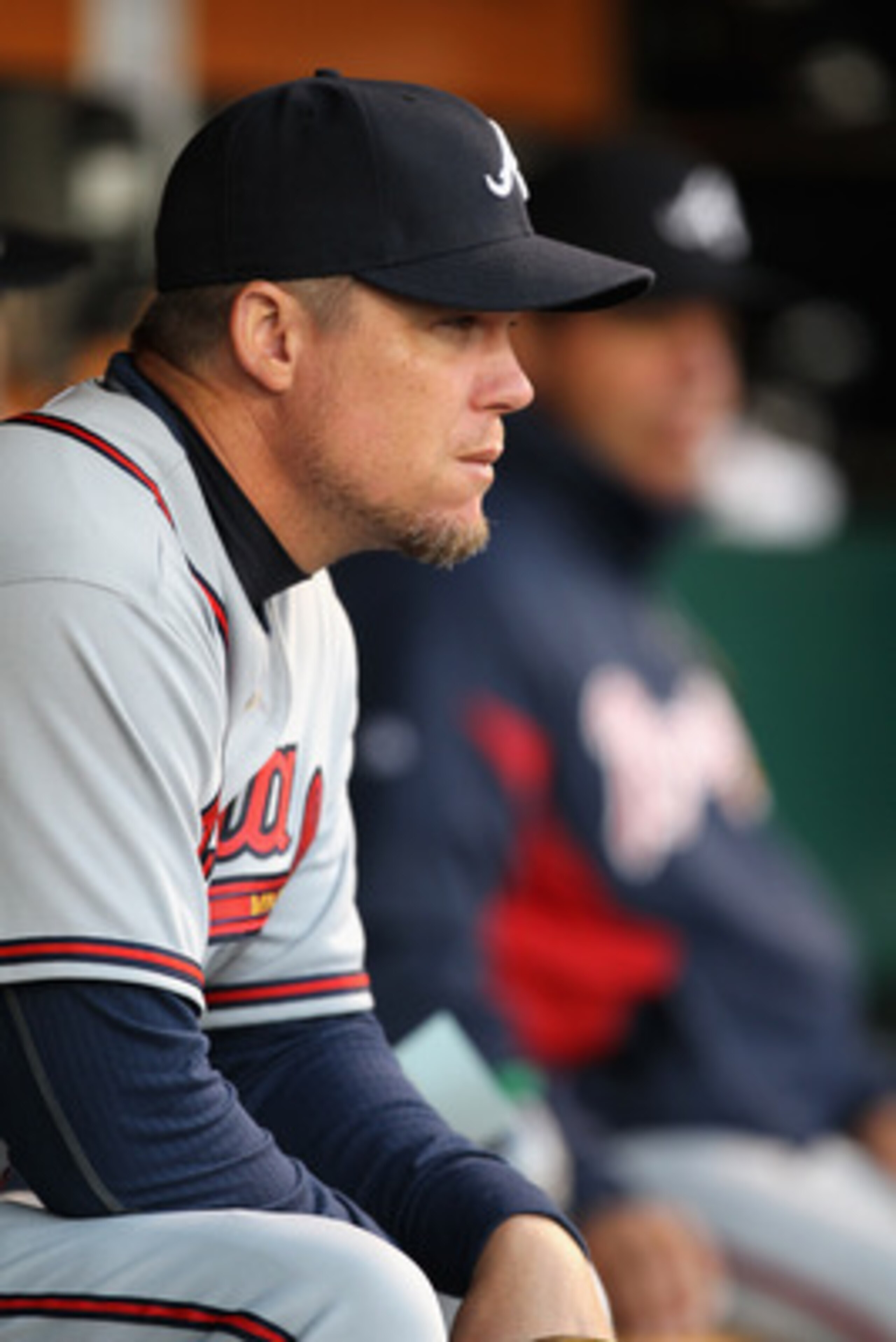 SAN FRANCISCO, CA - APRIL 22:  Chipper Jones #10 of the Atlanta Braves sits in the dugout before their game against the San Francisco Giants at AT&T Park on April 22, 2011 in San Francisco, California.  (Photo by Ezra Shaw/Getty Images)