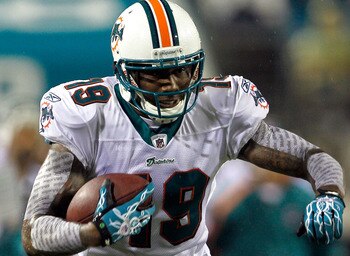 JACKSONVILLE, FL - AUGUST 21:  Brandon Marshall #19 of the Miami Dolphins runs after making a reception during the preseason game against the Jacksonville Jaguars at EverBank Field on August 21, 2010 in Jacksonville, Florida.  (Photo by Sam Greenwood/Gett